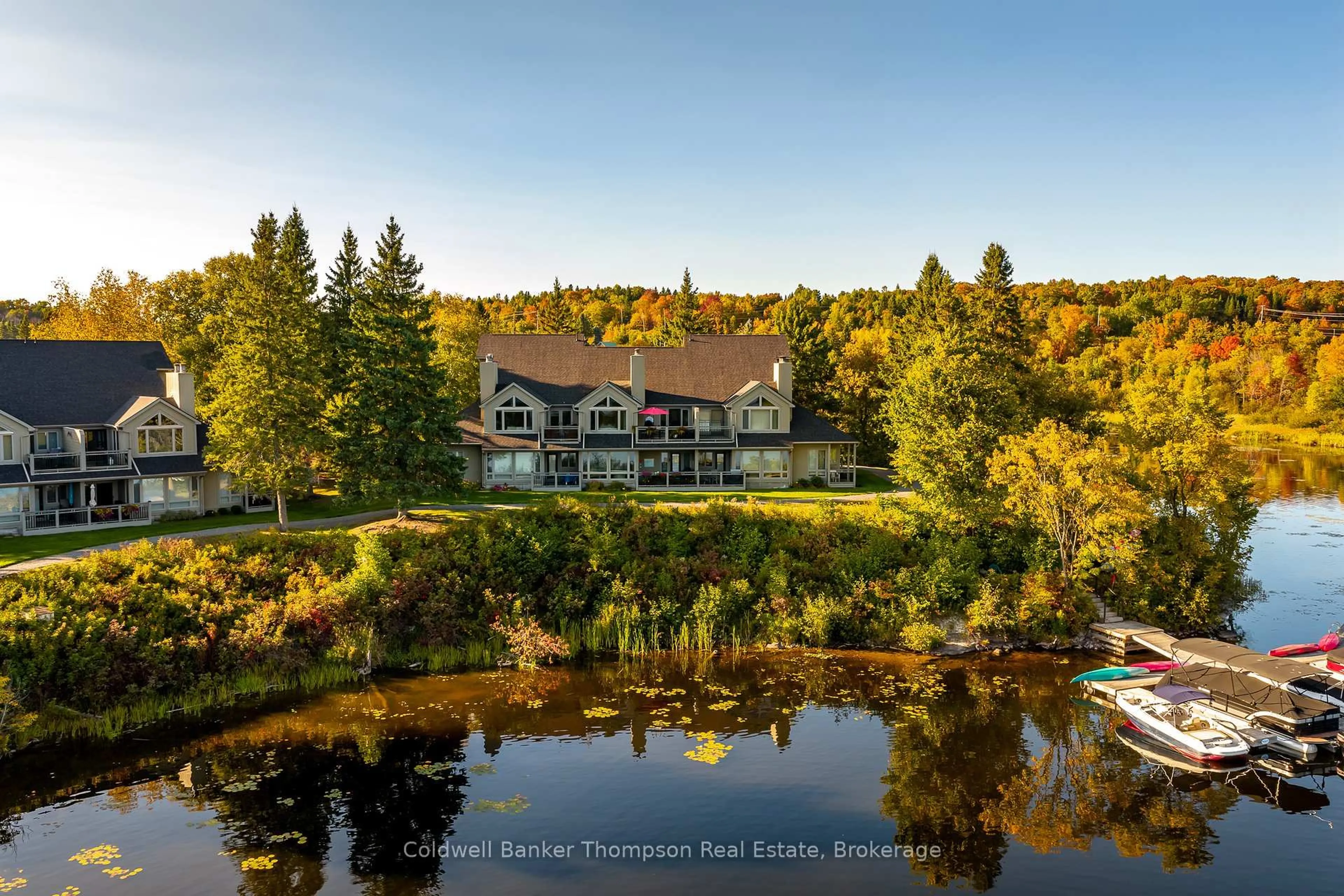 A pic from outside/outdoor area/front of a property/back of a property/a pic from drone, water/lake/river/ocean view for 4321 Grandview Bayside Dr, Huntsville Ontario P1H 2J5
