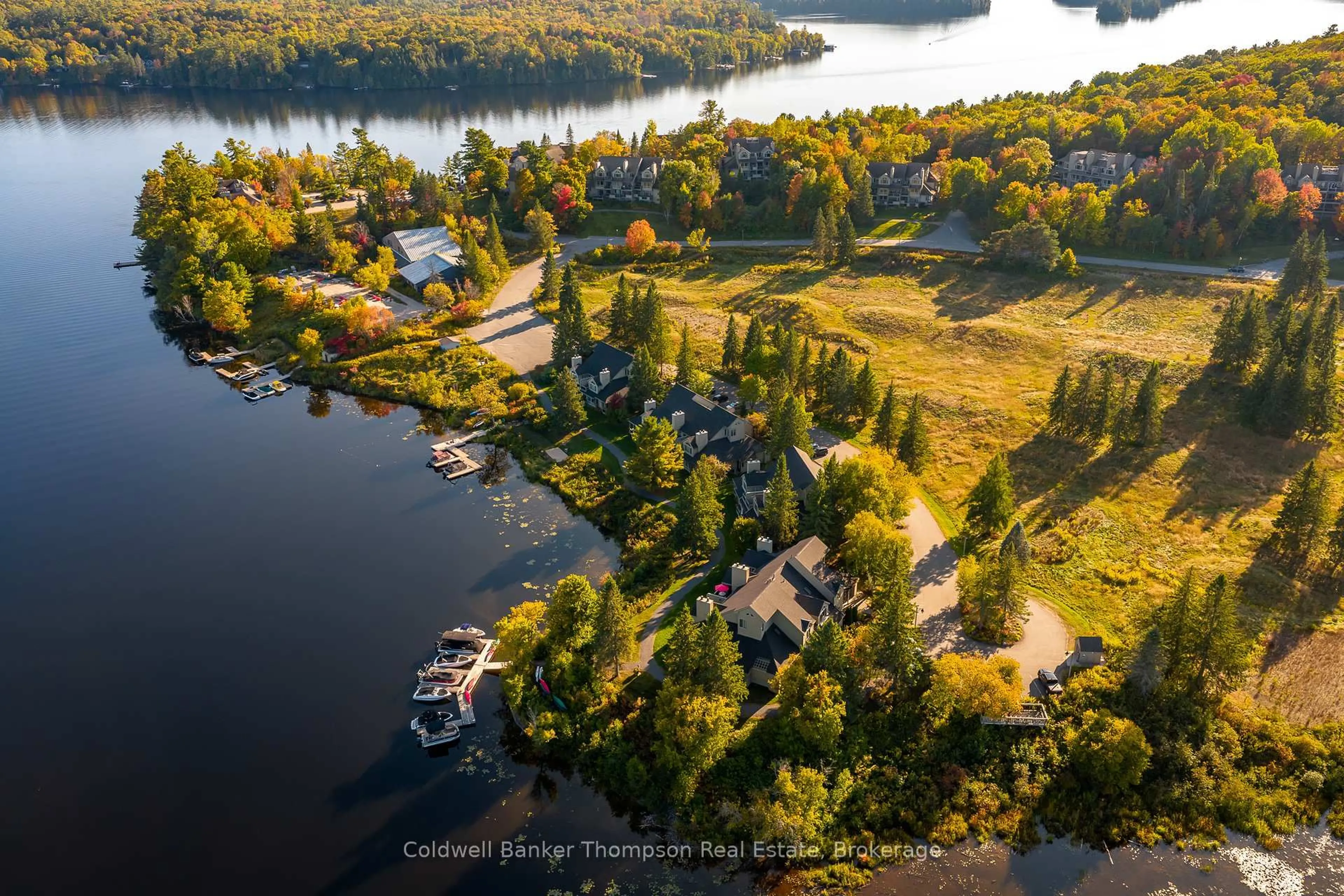 A pic from outside/outdoor area/front of a property/back of a property/a pic from drone, water/lake/river/ocean view for 4321 Grandview Bayside Dr, Huntsville Ontario P1H 2J5