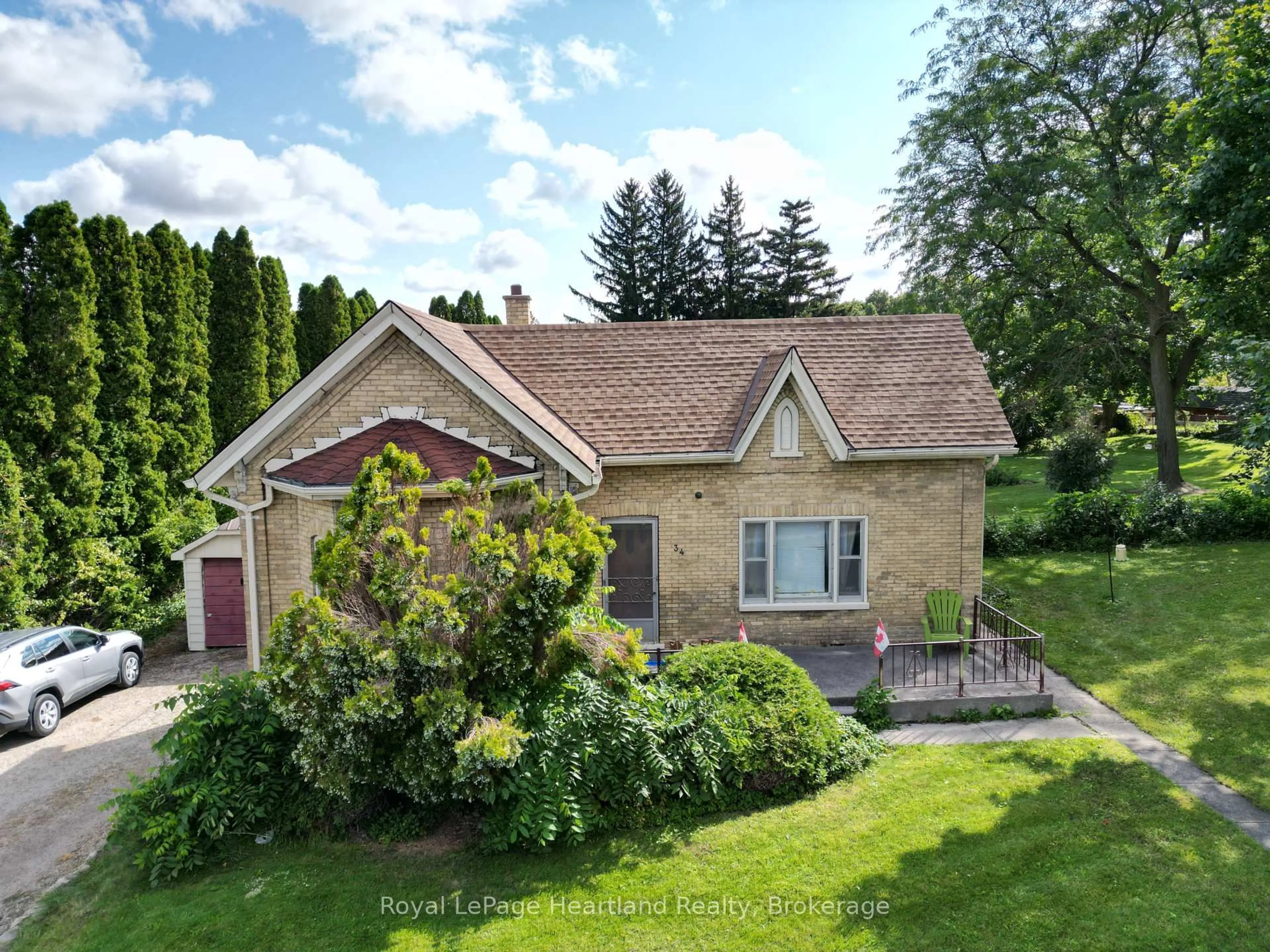 A pic from outside/outdoor area/front of a property/back of a property/a pic from drone, street for 34 Main St, South Huron Ontario N0M 1S1