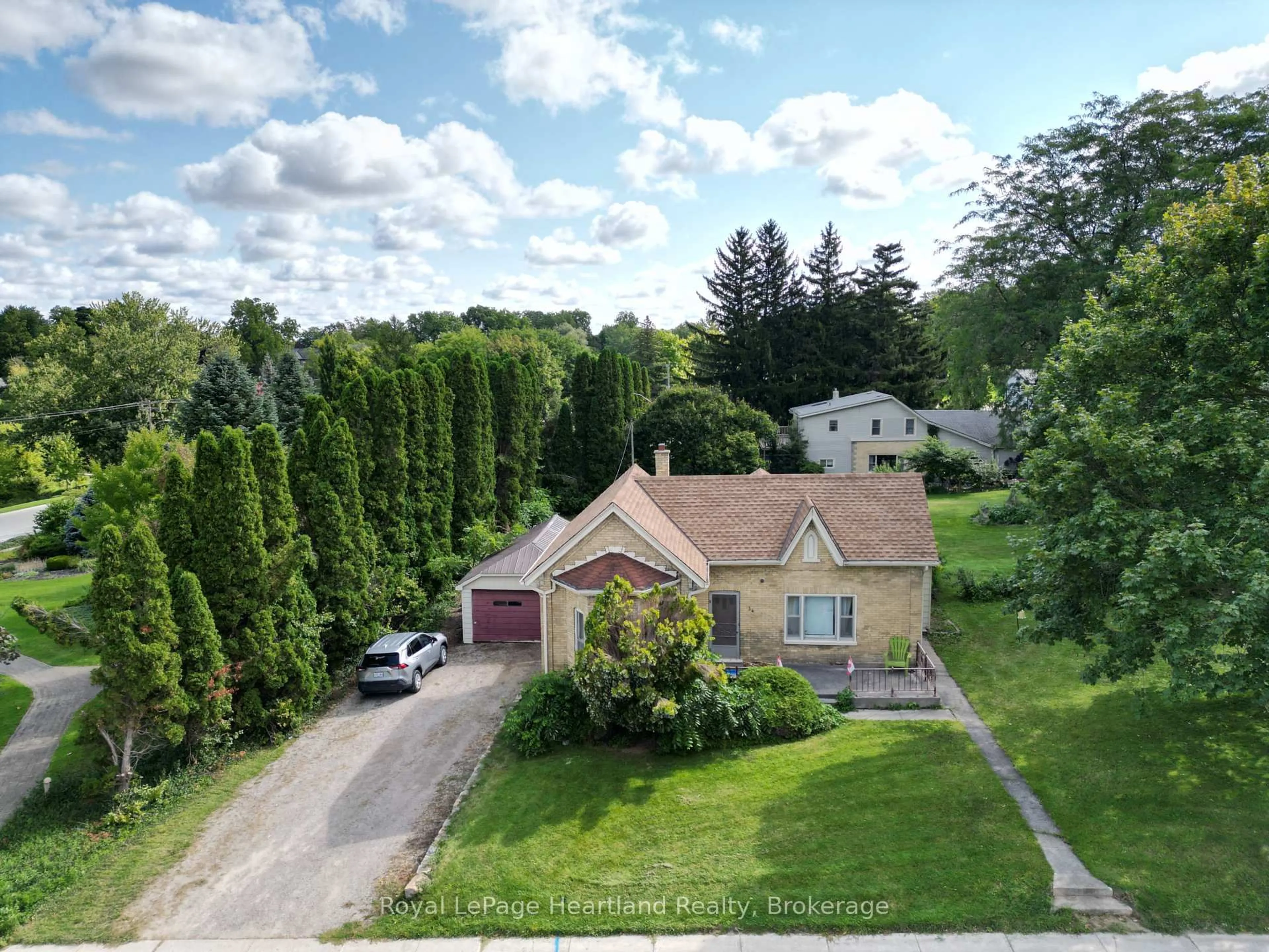 A pic from outside/outdoor area/front of a property/back of a property/a pic from drone, street for 34 Main St, South Huron Ontario N0M 1S1