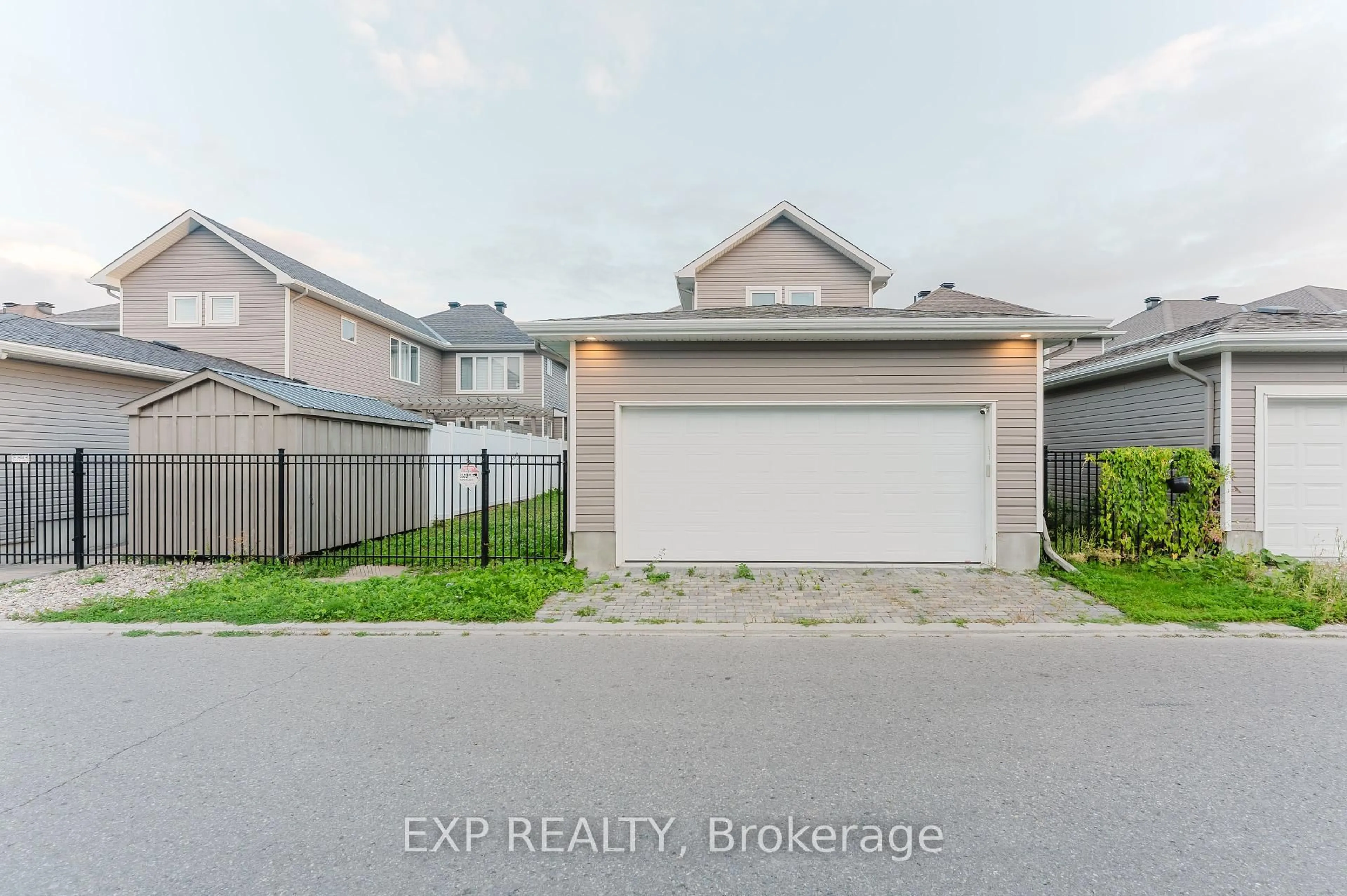 A pic from outside/outdoor area/front of a property/back of a property/a pic from drone, street for 177 Springbeauty Ave, Ottawa Ontario K2J 5T8
