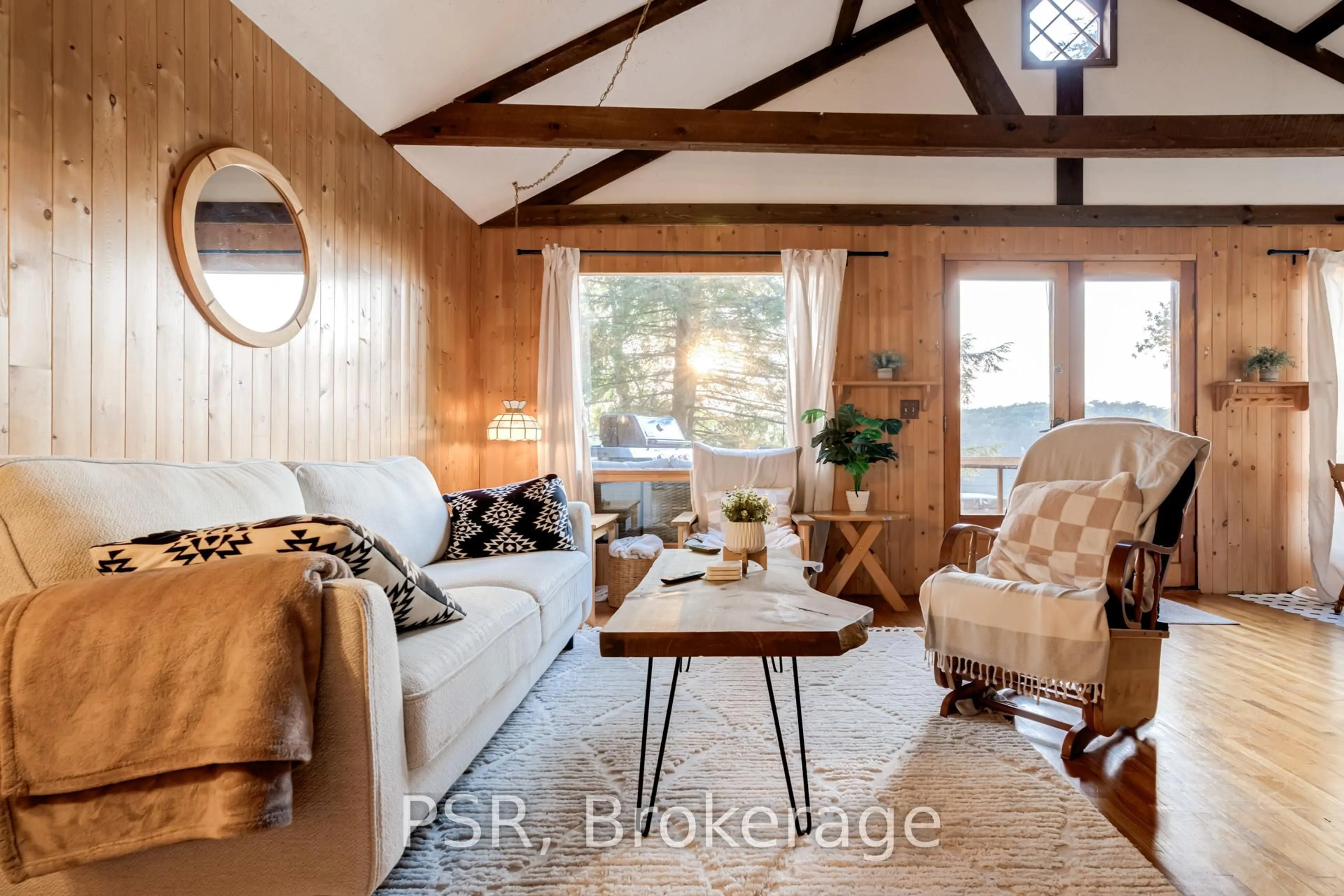 Living room with furniture, wood/laminate floor for 1027 NORTH PINE Dr, Lake of Bays Ontario P0A 1E0