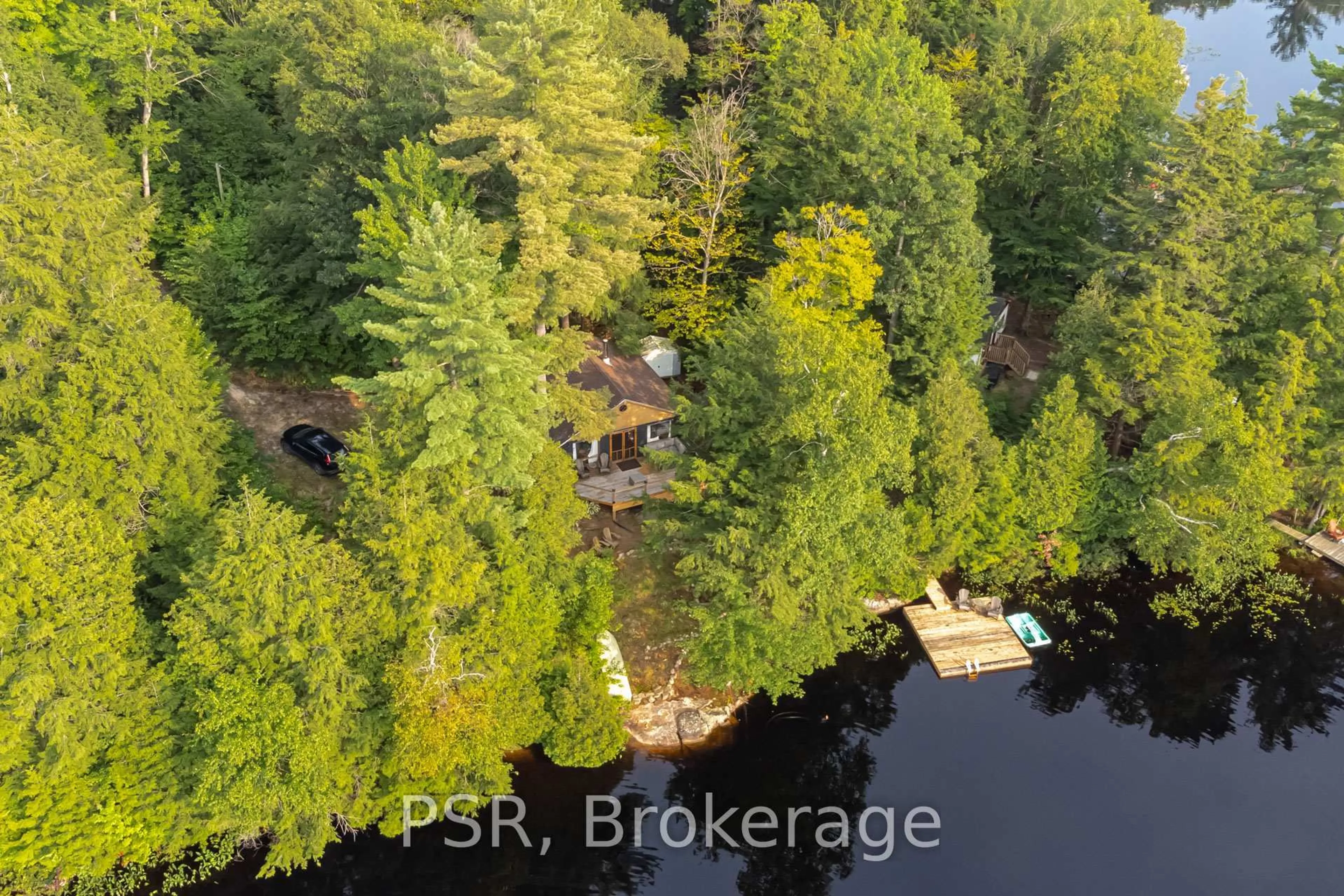 A pic from outside/outdoor area/front of a property/back of a property/a pic from drone, water/lake/river/ocean view for 1027 NORTH PINE Dr, Lake of Bays Ontario P0A 1E0
