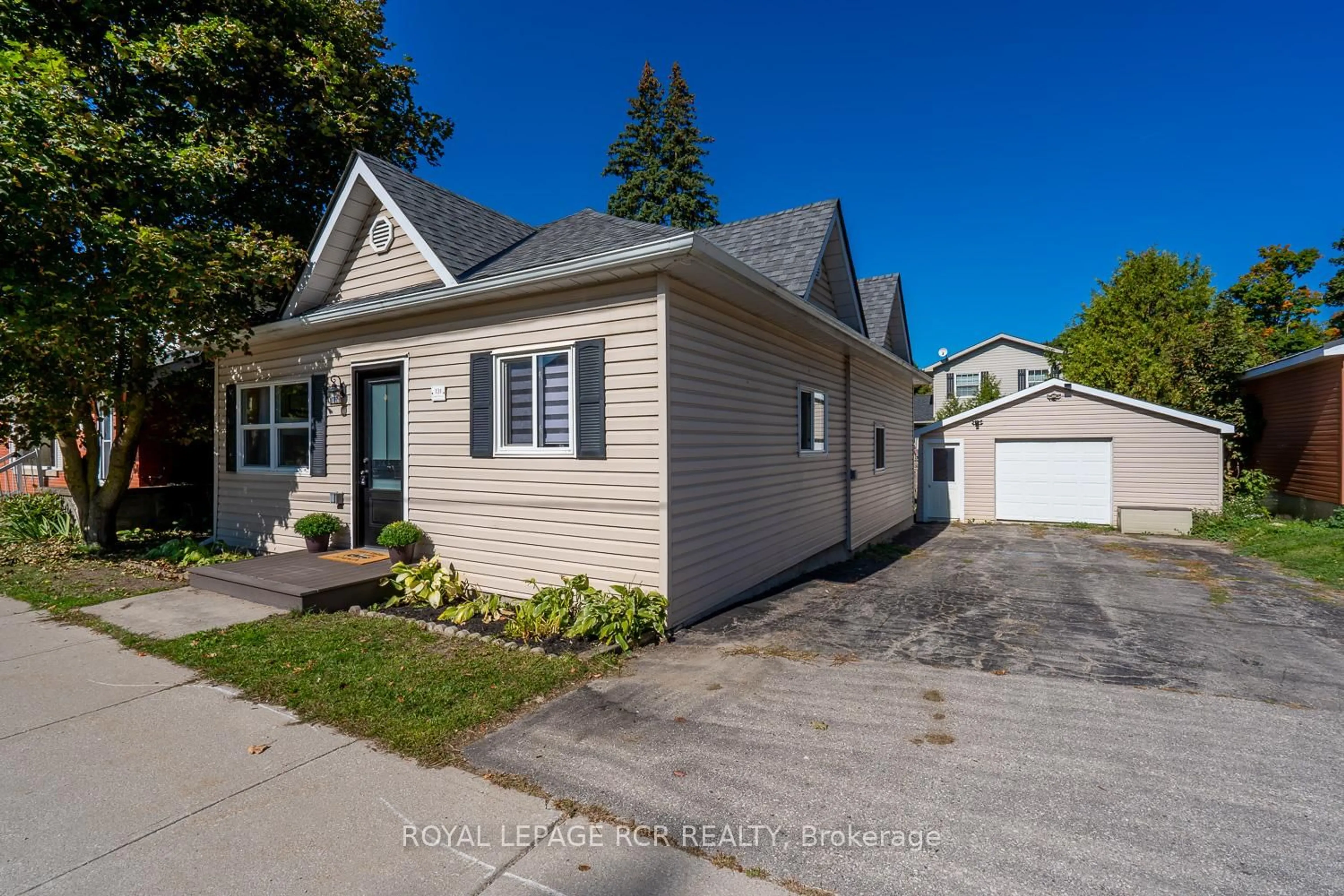 Home with vinyl exterior material, street for 131 Frederick St, Wellington North Ontario N0G 1A0