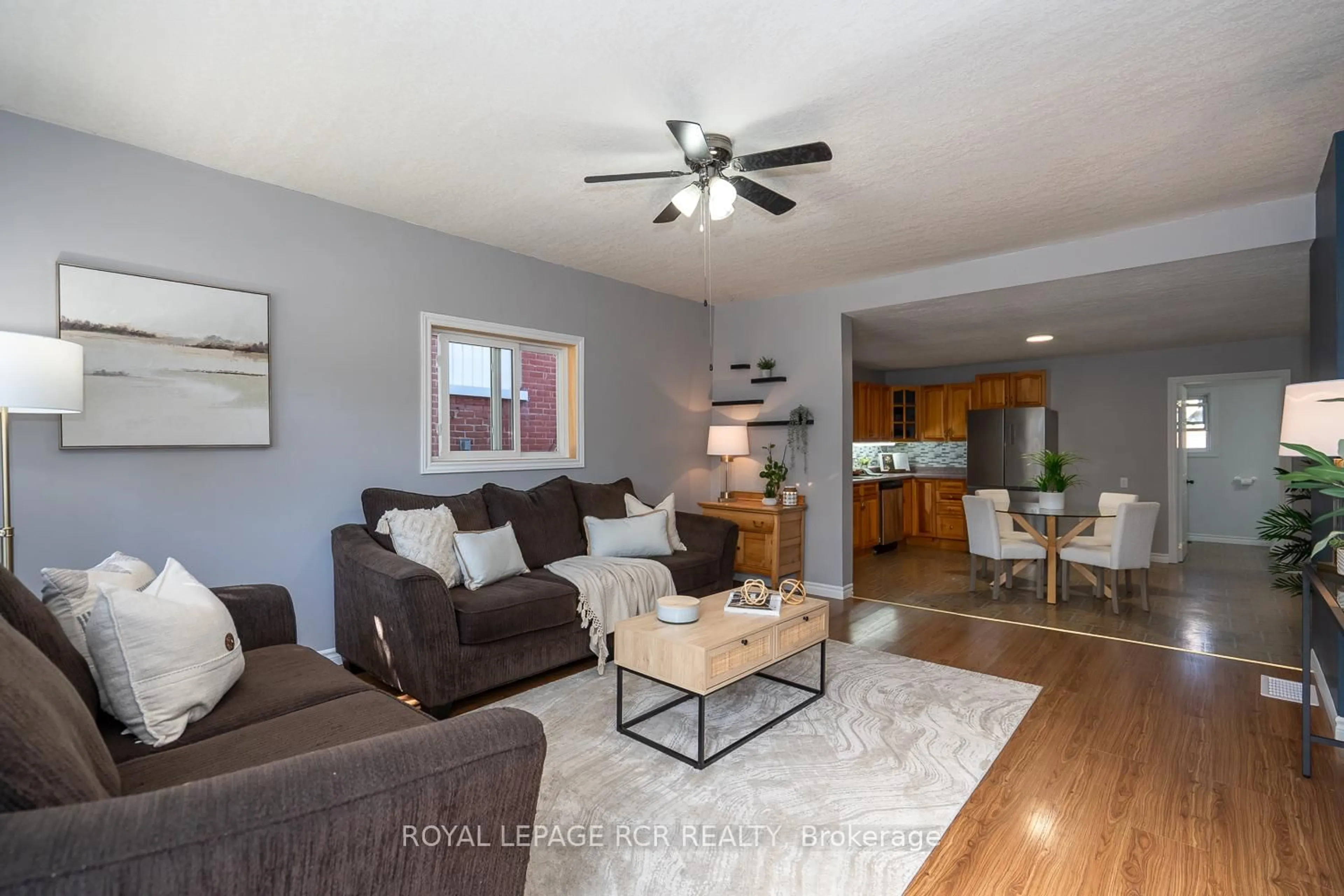 Living room with furniture, wood/laminate floor for 131 Frederick St, Wellington North Ontario N0G 1A0