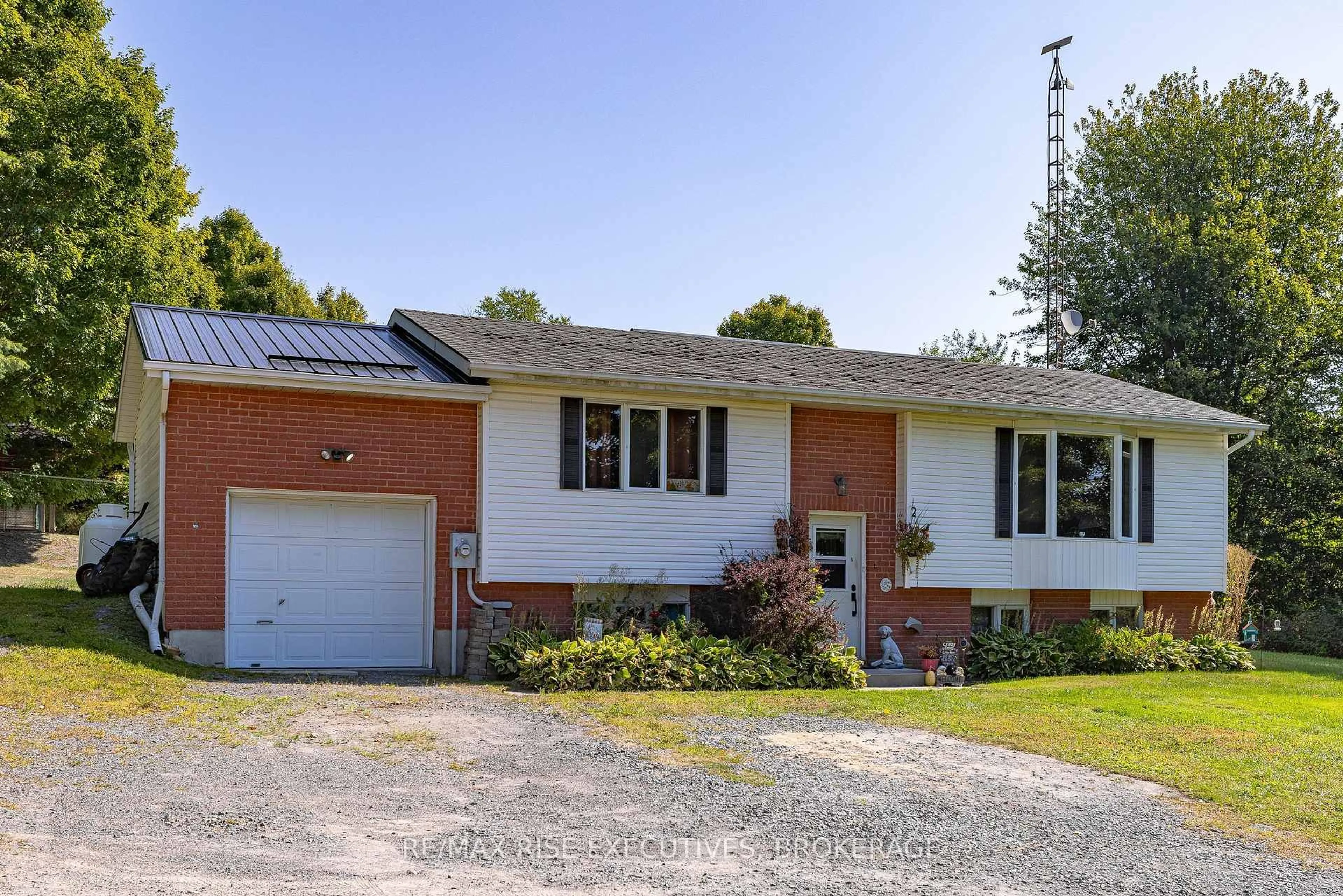 Home with brick exterior material, street for 9009 Perth Rd, Rideau Lakes Ontario K0G 1X0