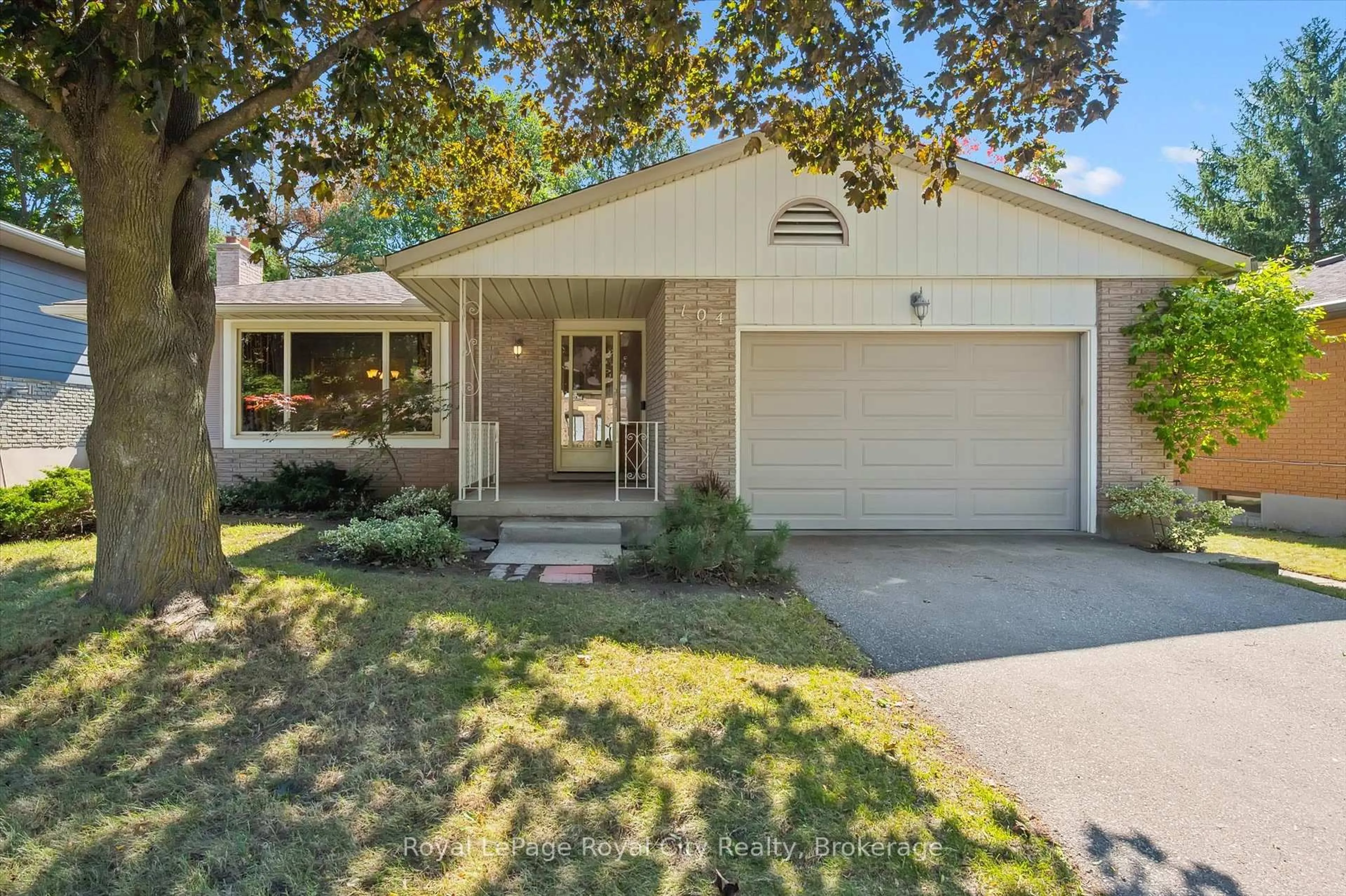 Home with vinyl exterior material, street for 104 Harvard Rd, Guelph Ontario N1G 2Z2