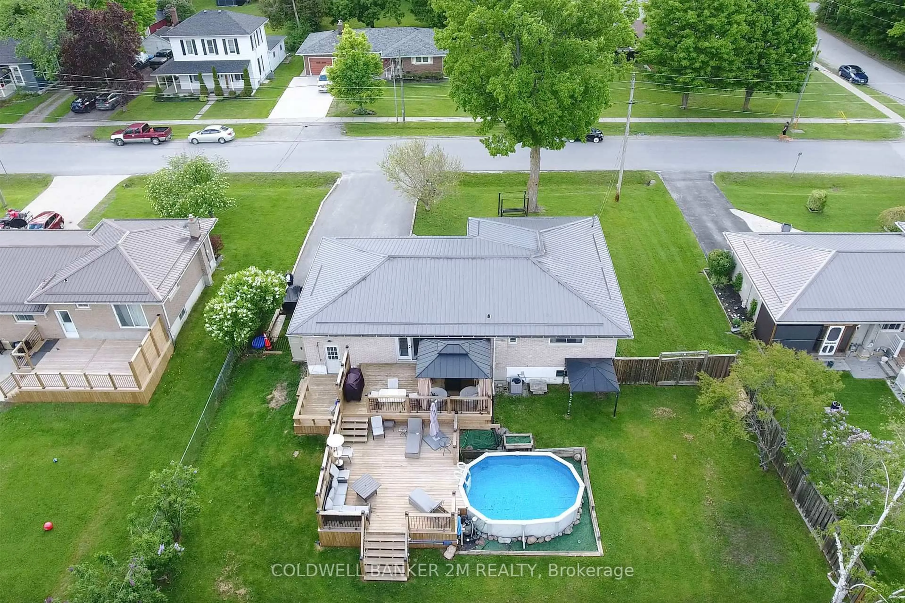 A pic from outside/outdoor area/front of a property/back of a property/a pic from drone, water/lake/river/ocean view for 27 Anne St, Cavan Monaghan Ontario L0A 1G0