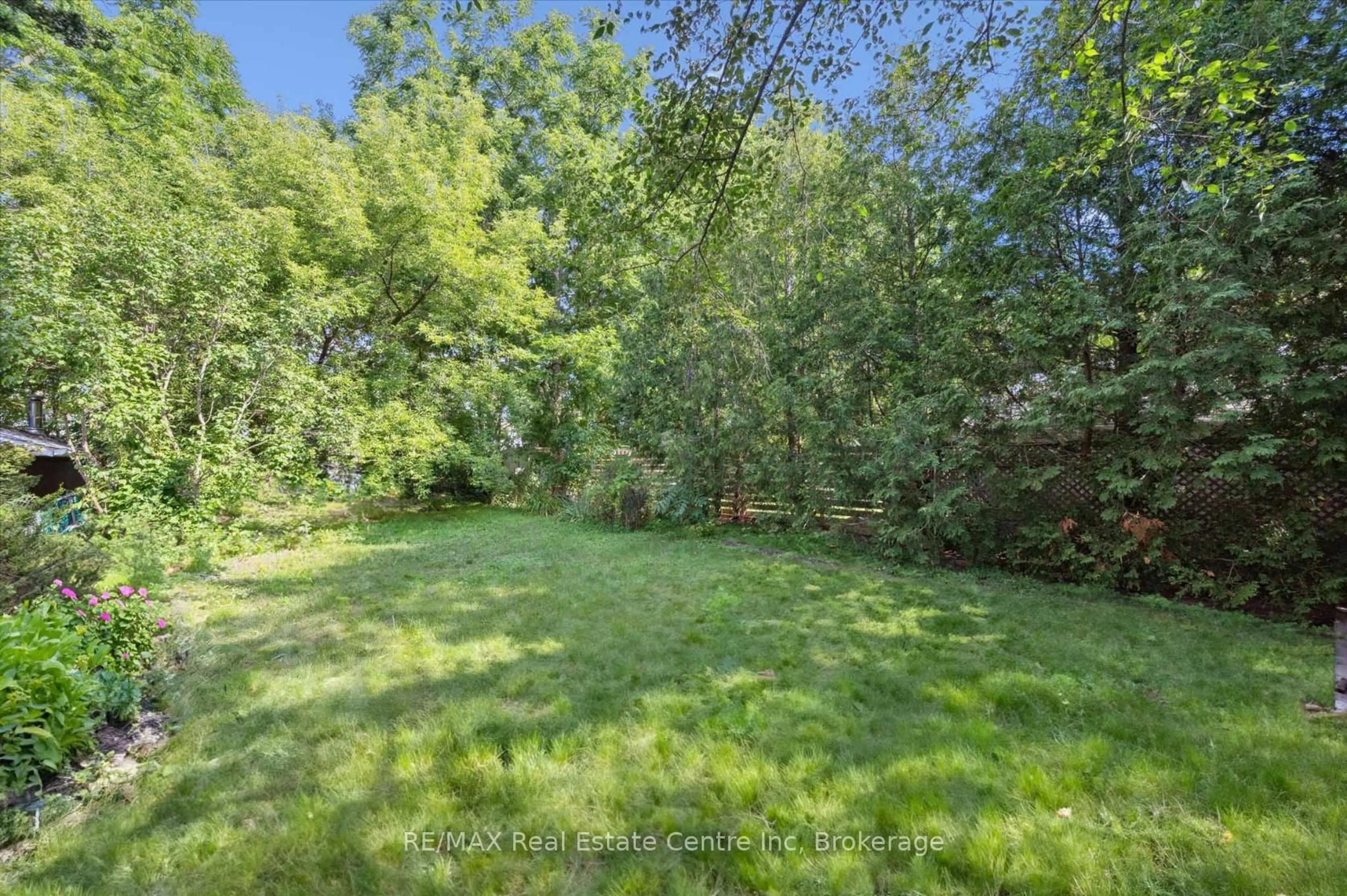 A pic from outside/outdoor area/front of a property/back of a property/a pic from drone, forest/trees view for 265 London Rd, Guelph Ontario N1H 2C7