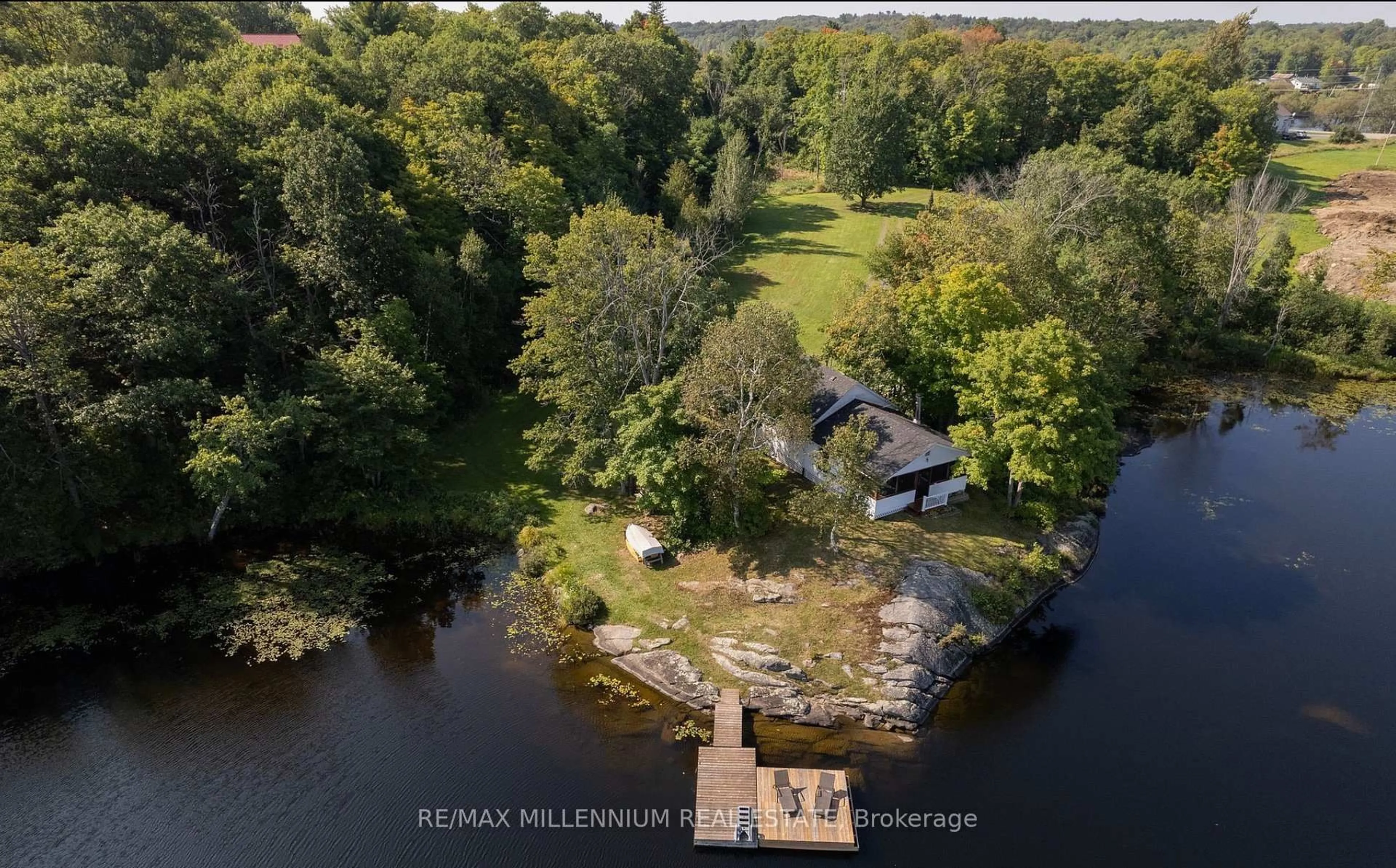 A pic from outside/outdoor area/front of a property/back of a property/a pic from drone, water/lake/river/ocean view for 695 High Way #124, McKellar Ontario P0G 1C0
