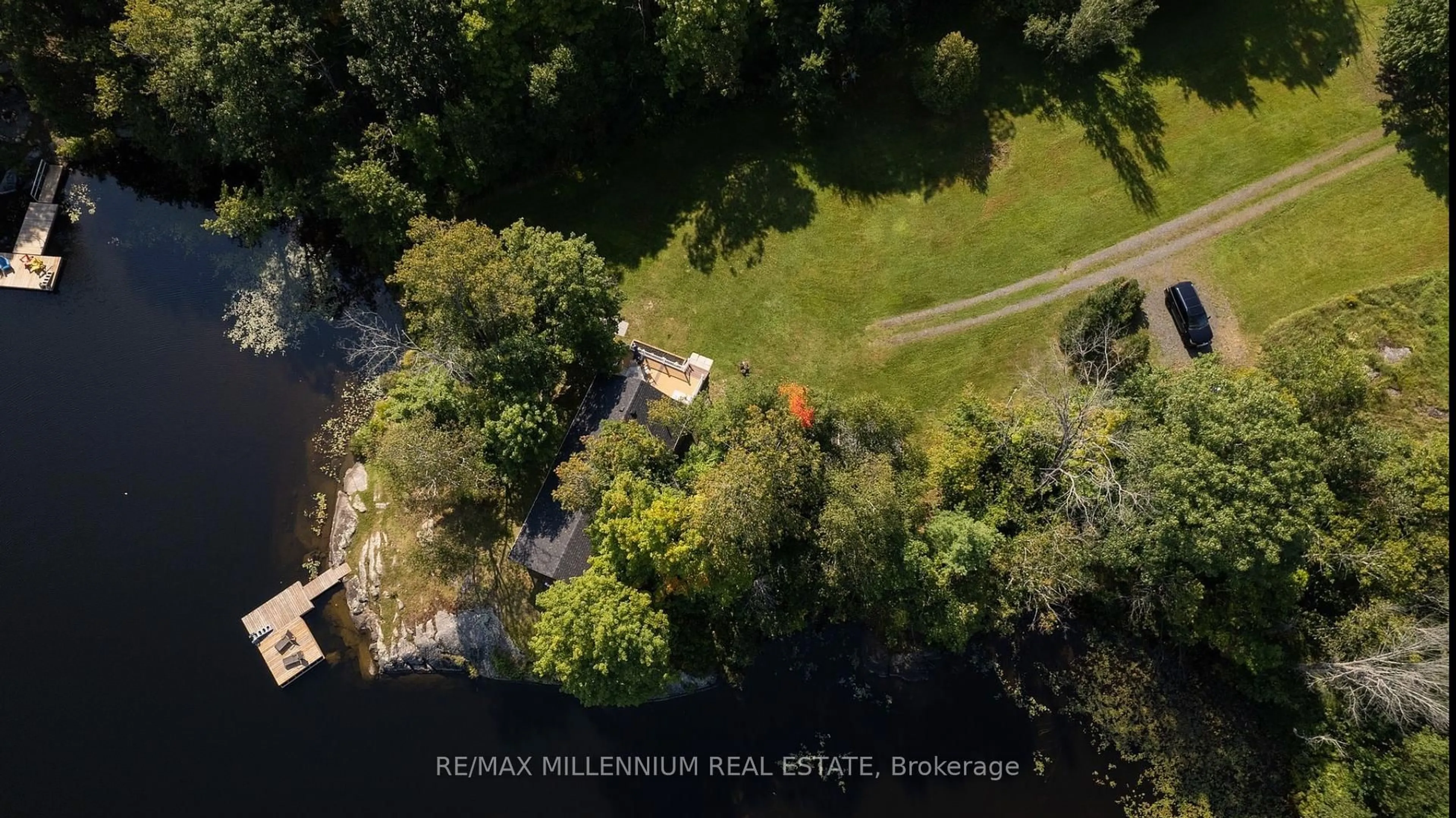 A pic from outside/outdoor area/front of a property/back of a property/a pic from drone, unknown for 695 High Way #124, McKellar Ontario P0G 1C0
