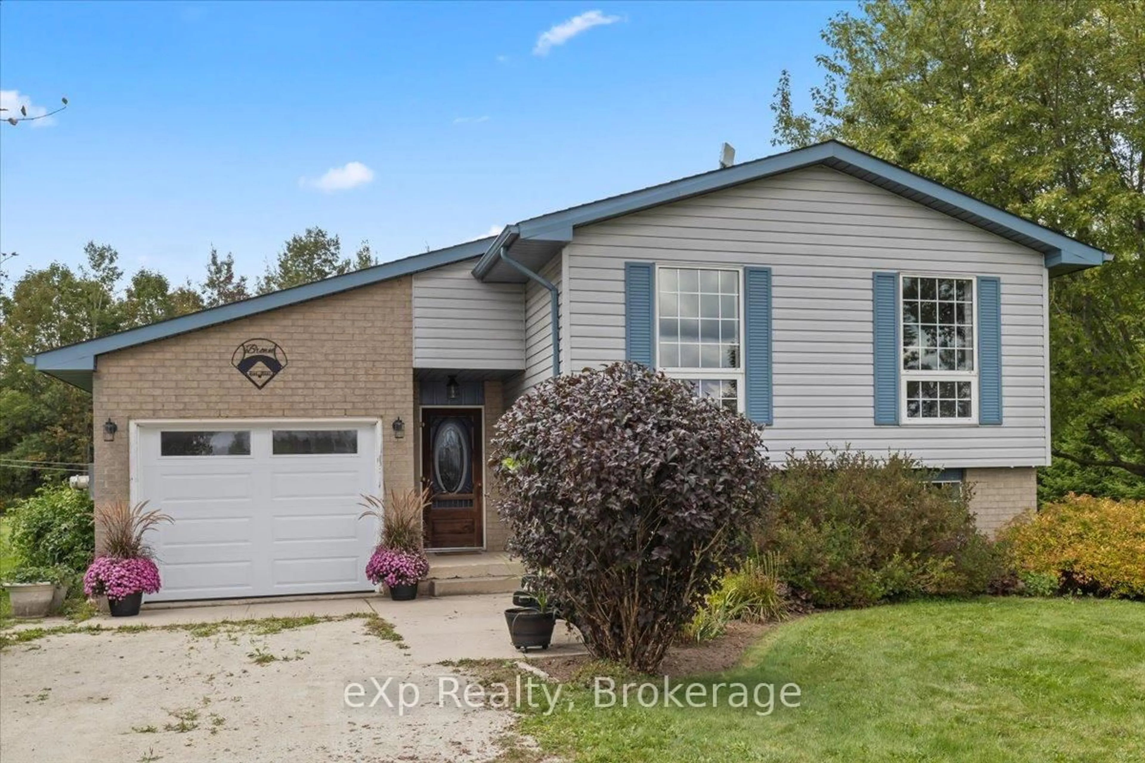 Home with vinyl exterior material, street for 112260 Grey 14 Rd, Southgate Ontario N0C 1B0