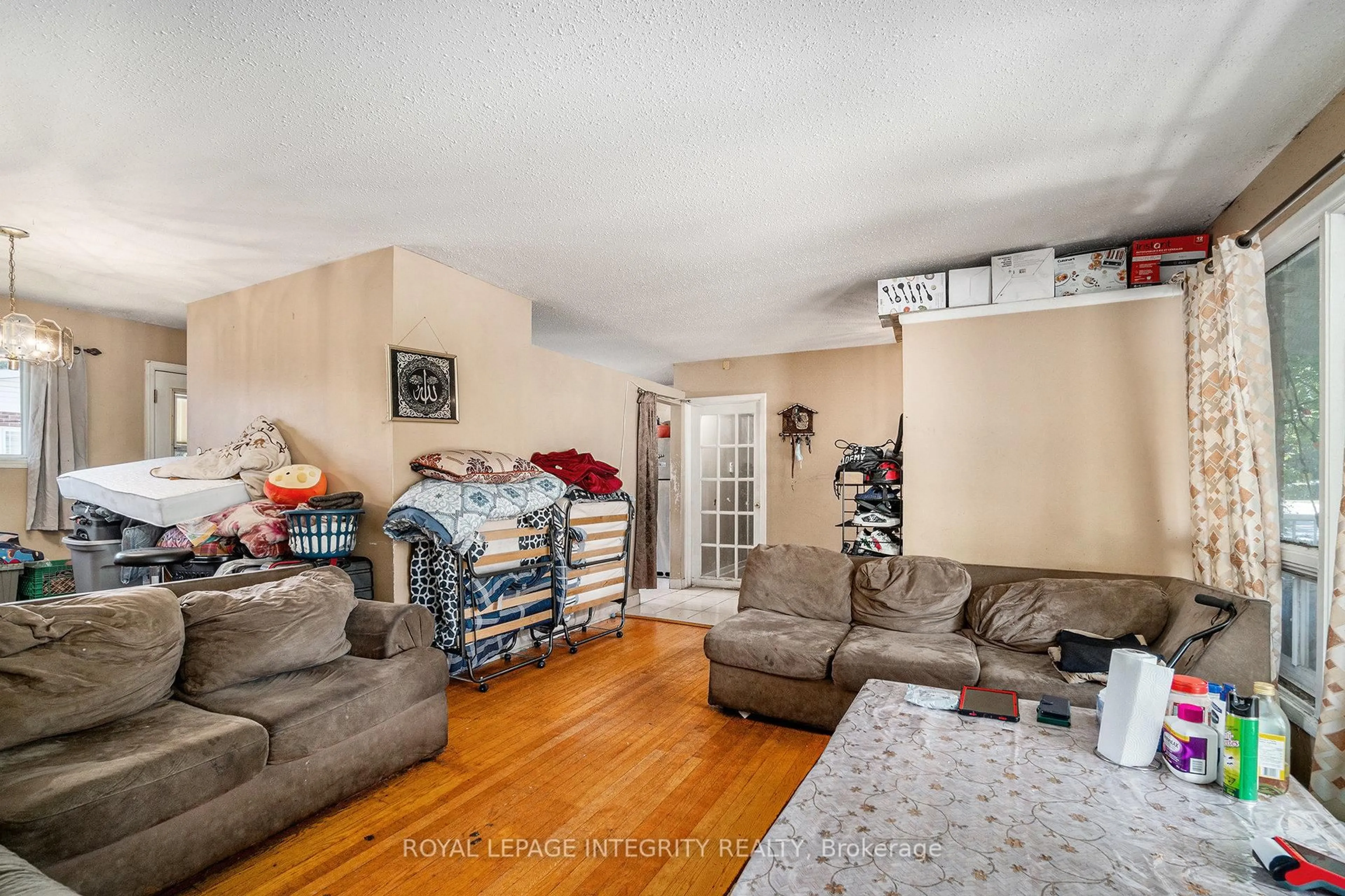 Living room with furniture, unknown for 1136 Deer Park Rd, Ottawa Ontario K2E 6H1