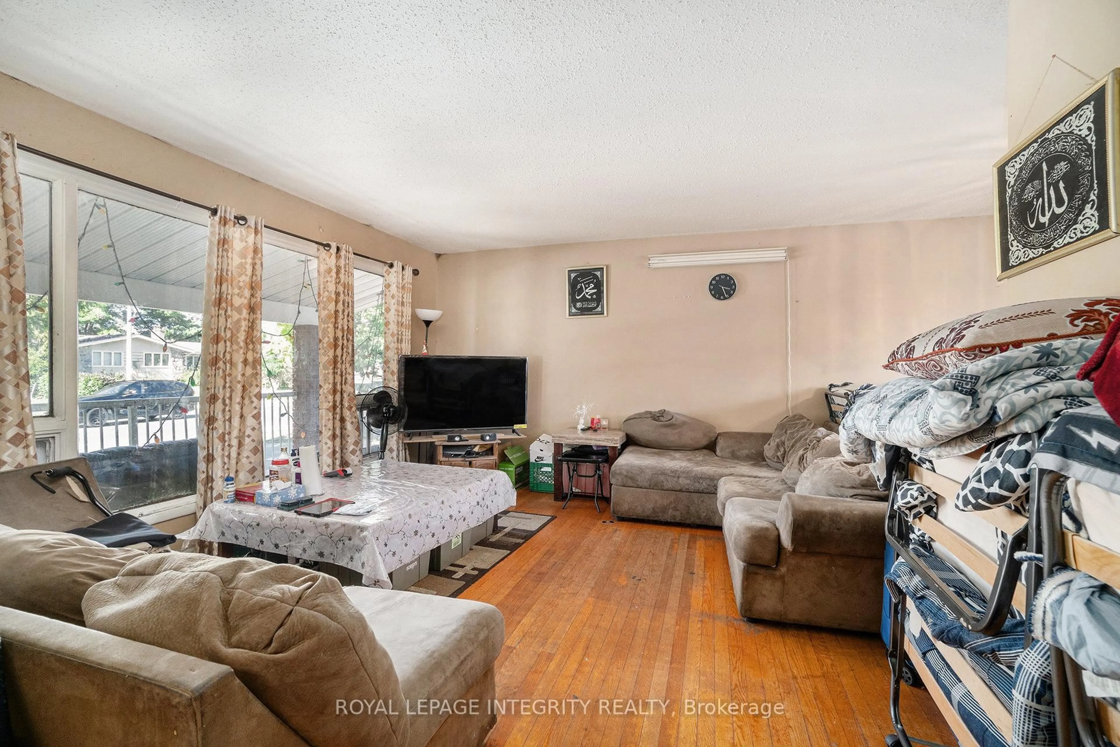 Living room with furniture, unknown for 1136 Deer Park Rd, Ottawa Ontario K2E 6H1