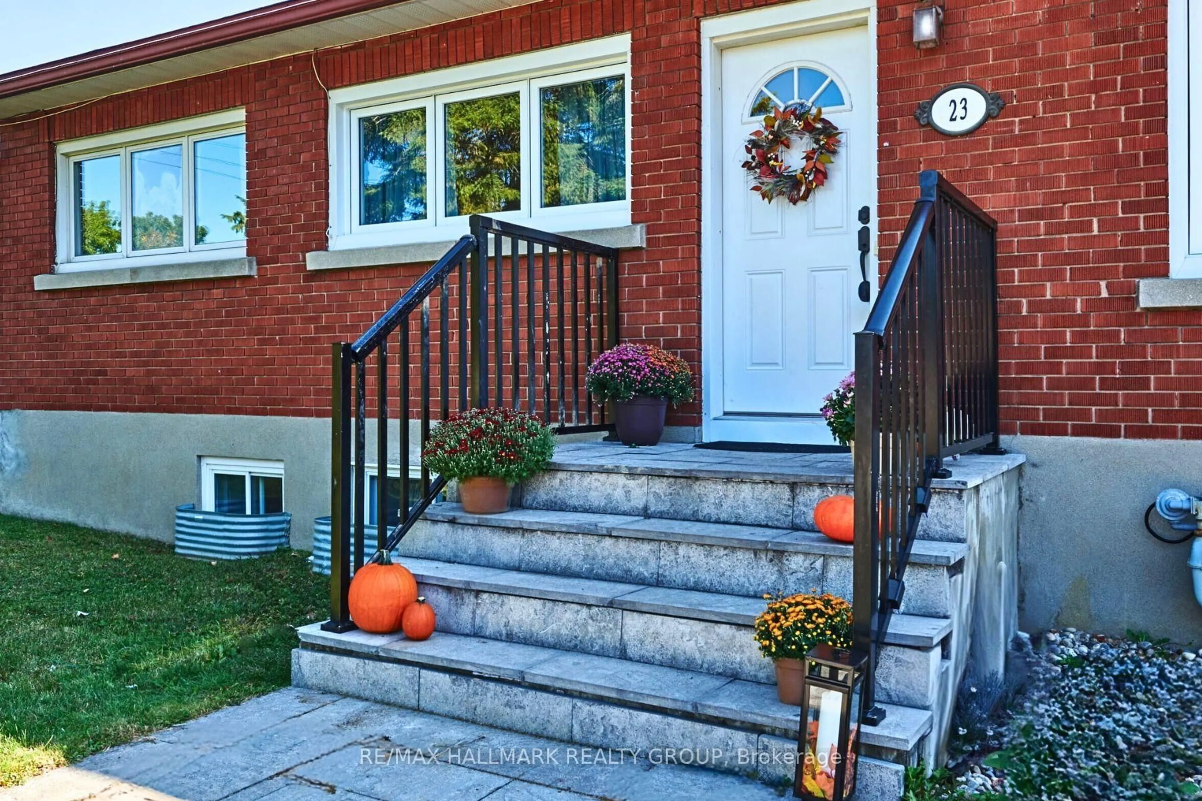 Home with brick exterior material, street for 23 Elvina St, Ottawa Ontario K1J 7L2