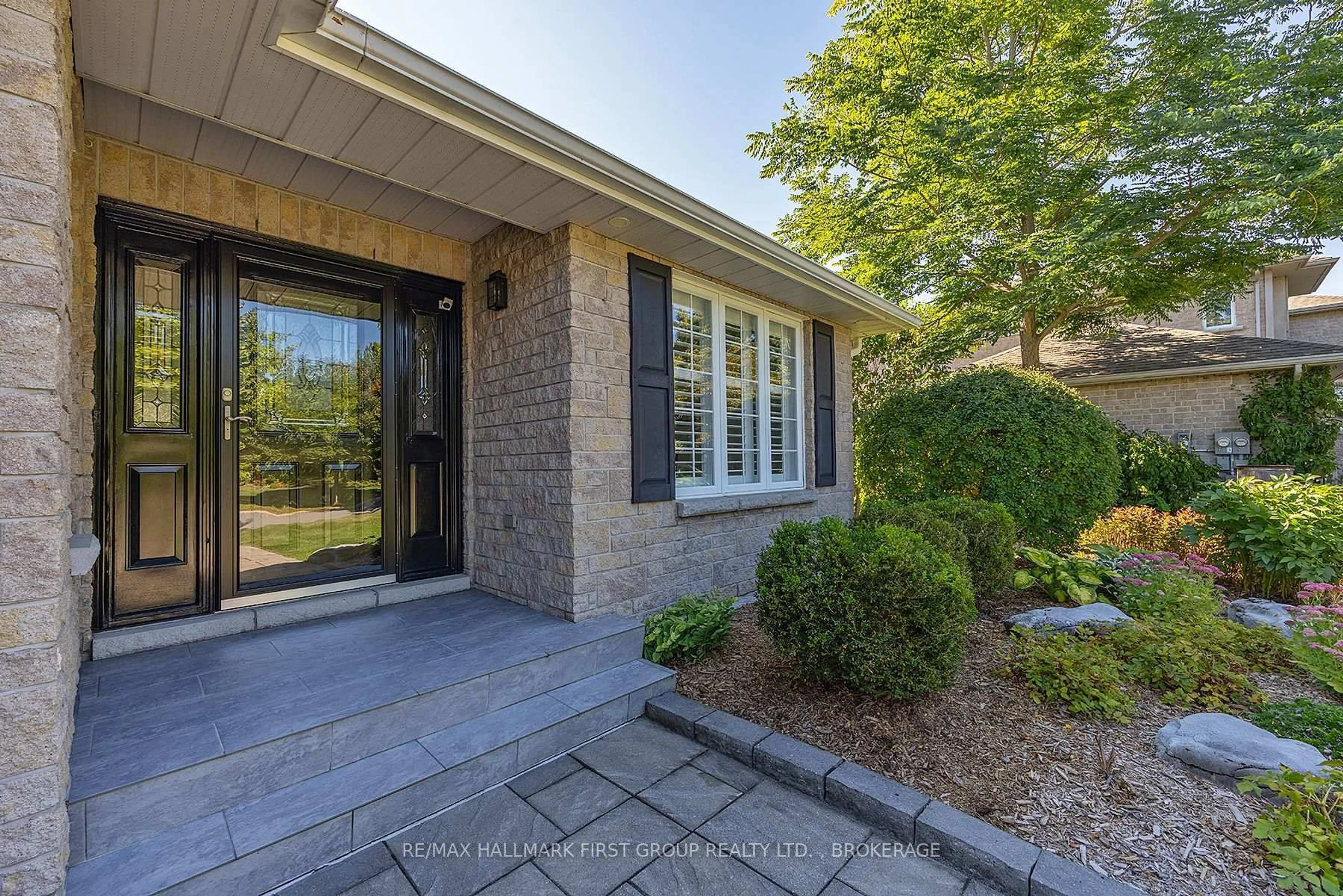 Home with brick exterior material, street for 213 Smuggler's Cove Dr, Kingston Ontario K7M 9C6
