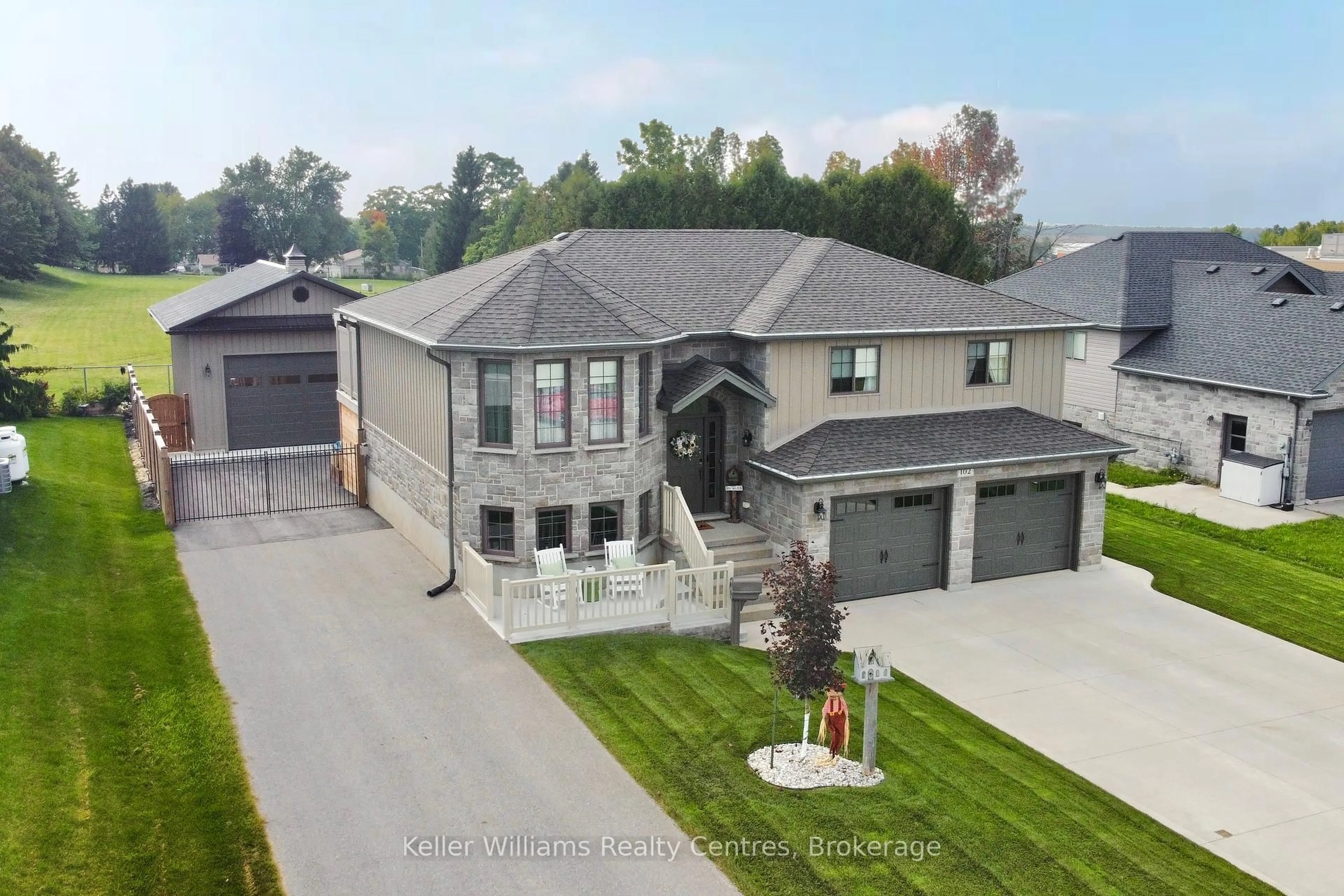 A pic from outside/outdoor area/front of a property/back of a property/a pic from drone, street for 102 Tower Rd, Arran-Elderslie Ontario N0G 1L0