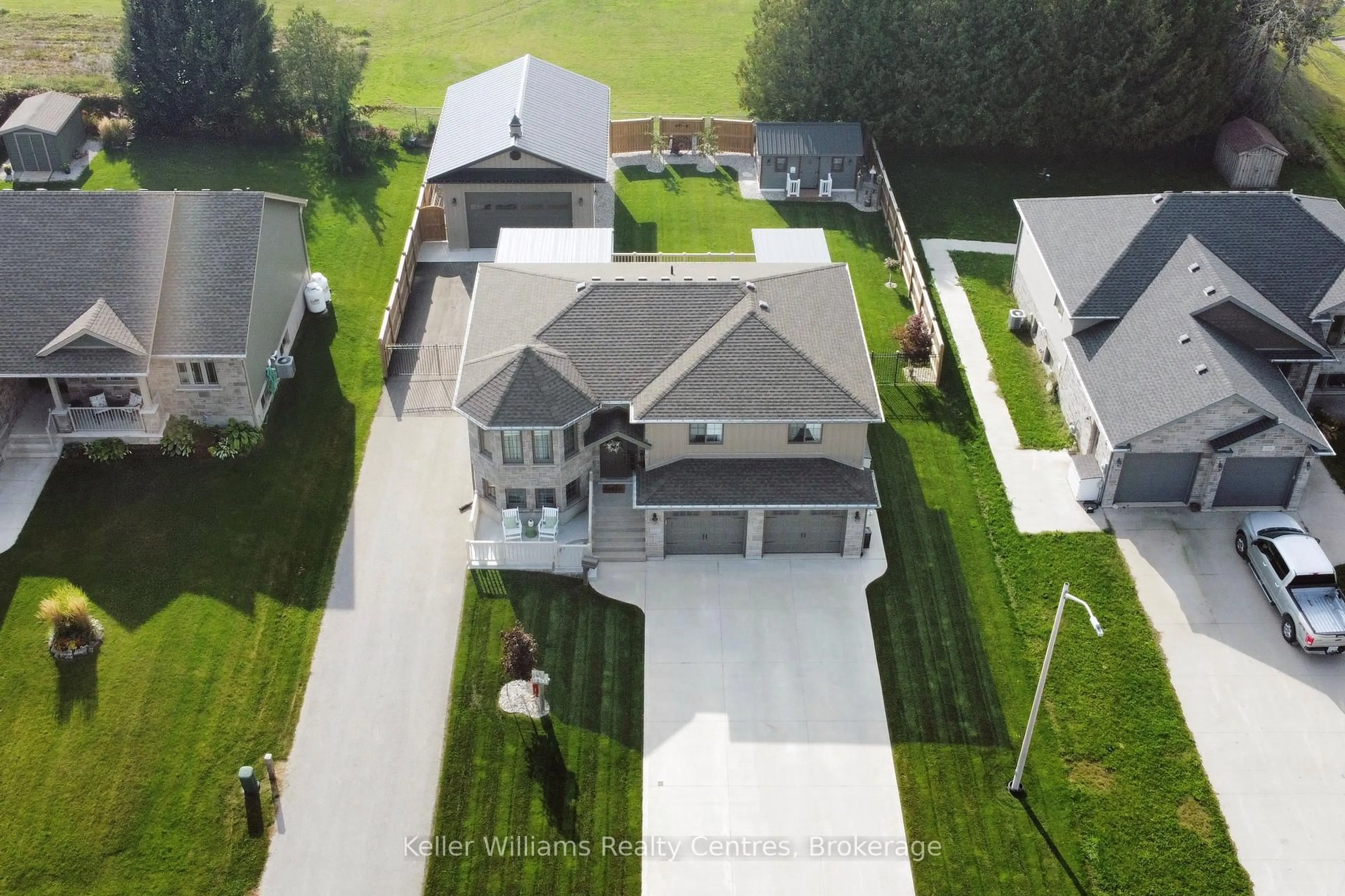 A pic from outside/outdoor area/front of a property/back of a property/a pic from drone, street for 102 Tower Rd, Arran-Elderslie Ontario N0G 1L0