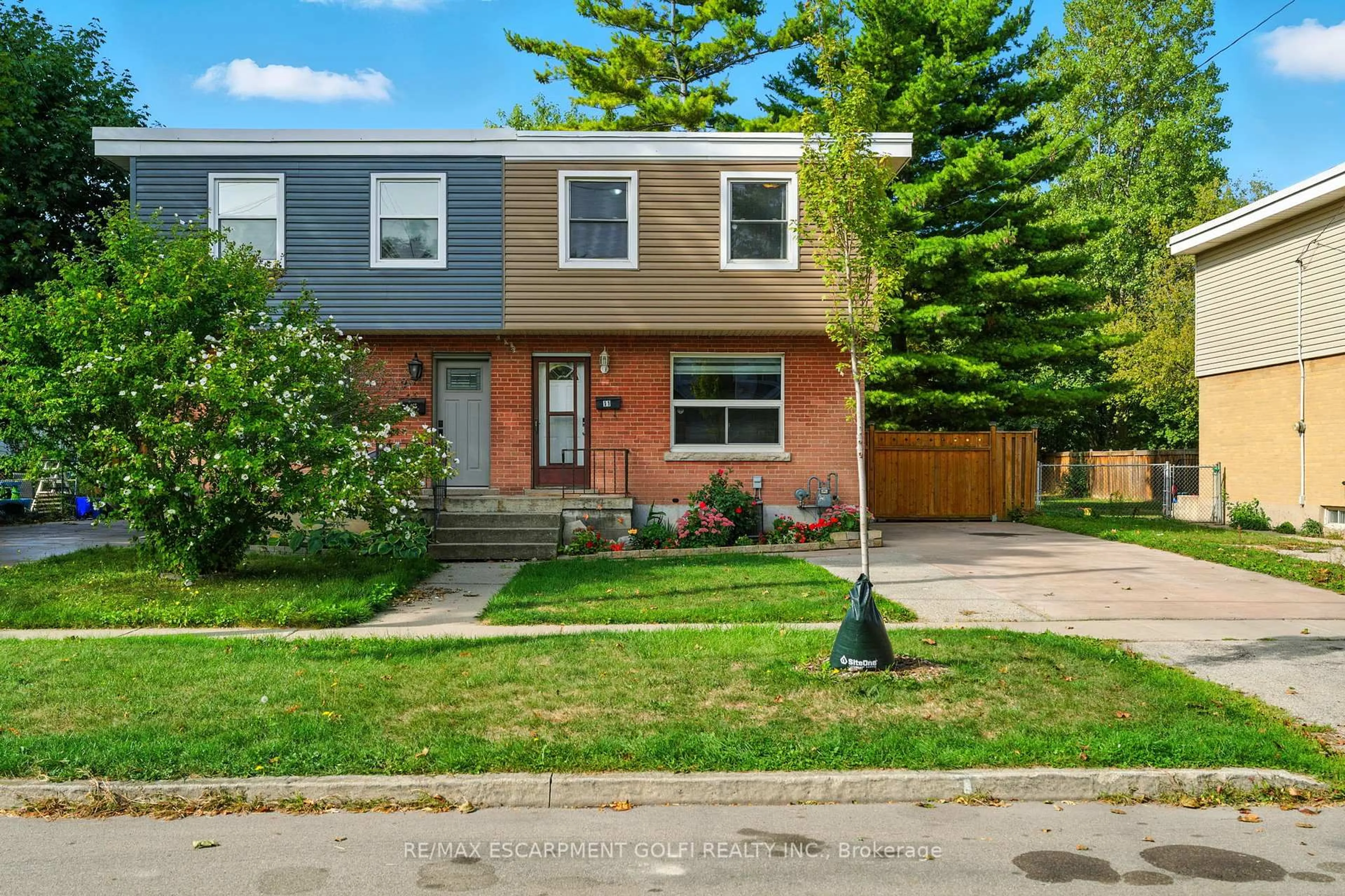 Home with brick exterior material, street for 11 Eastvale Pl, Hamilton Ontario L8H 1N9