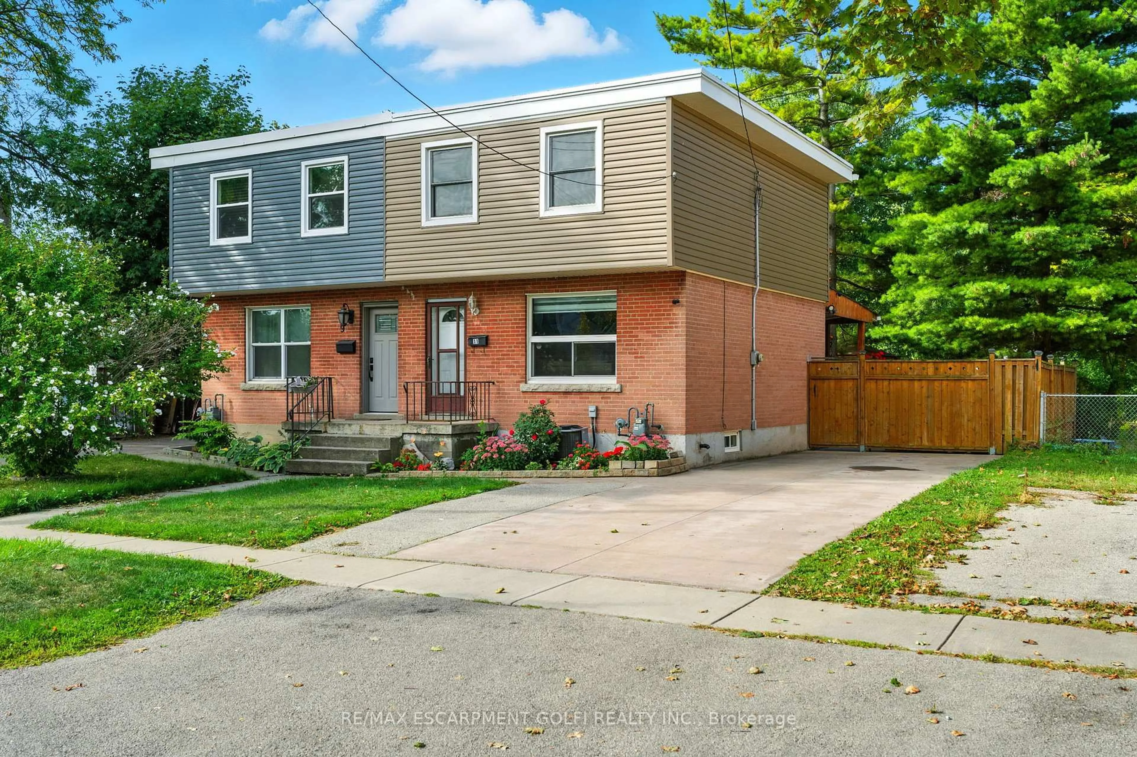 Home with brick exterior material, street for 11 Eastvale Pl, Hamilton Ontario L8H 1N9