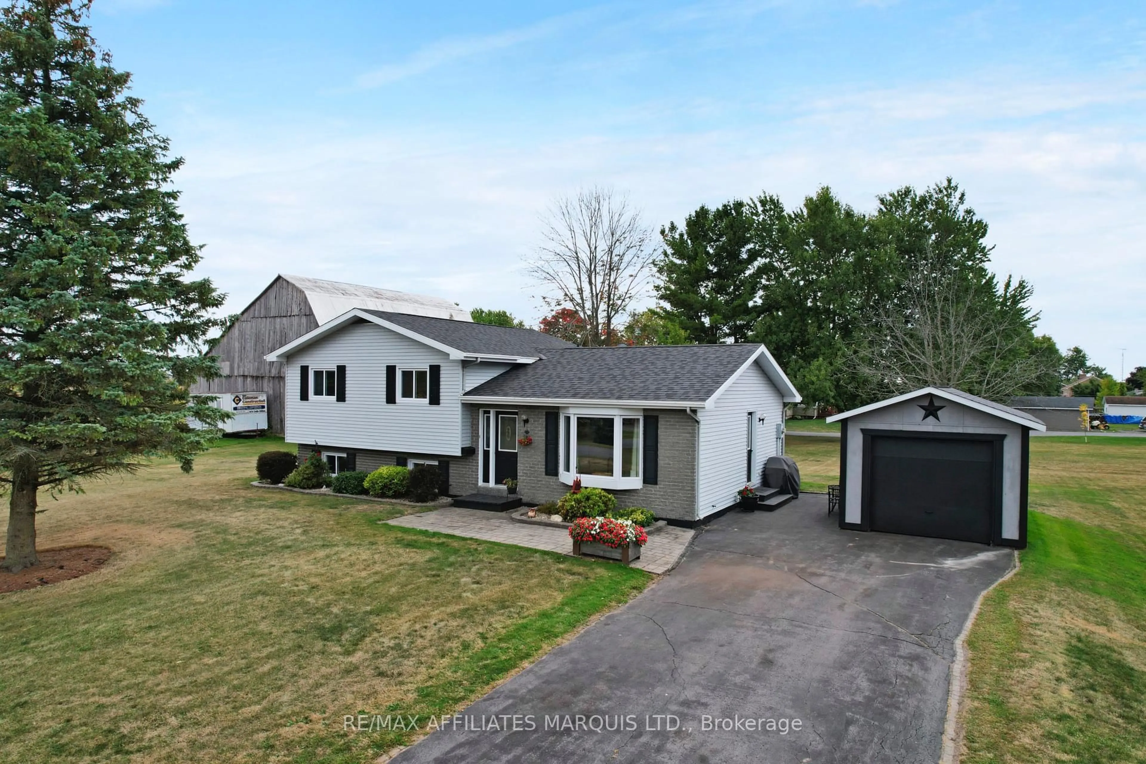 A pic from outside/outdoor area/front of a property/back of a property/a pic from drone, street for 3294 ST JOHN St, North Stormont Ontario K0C 1E0
