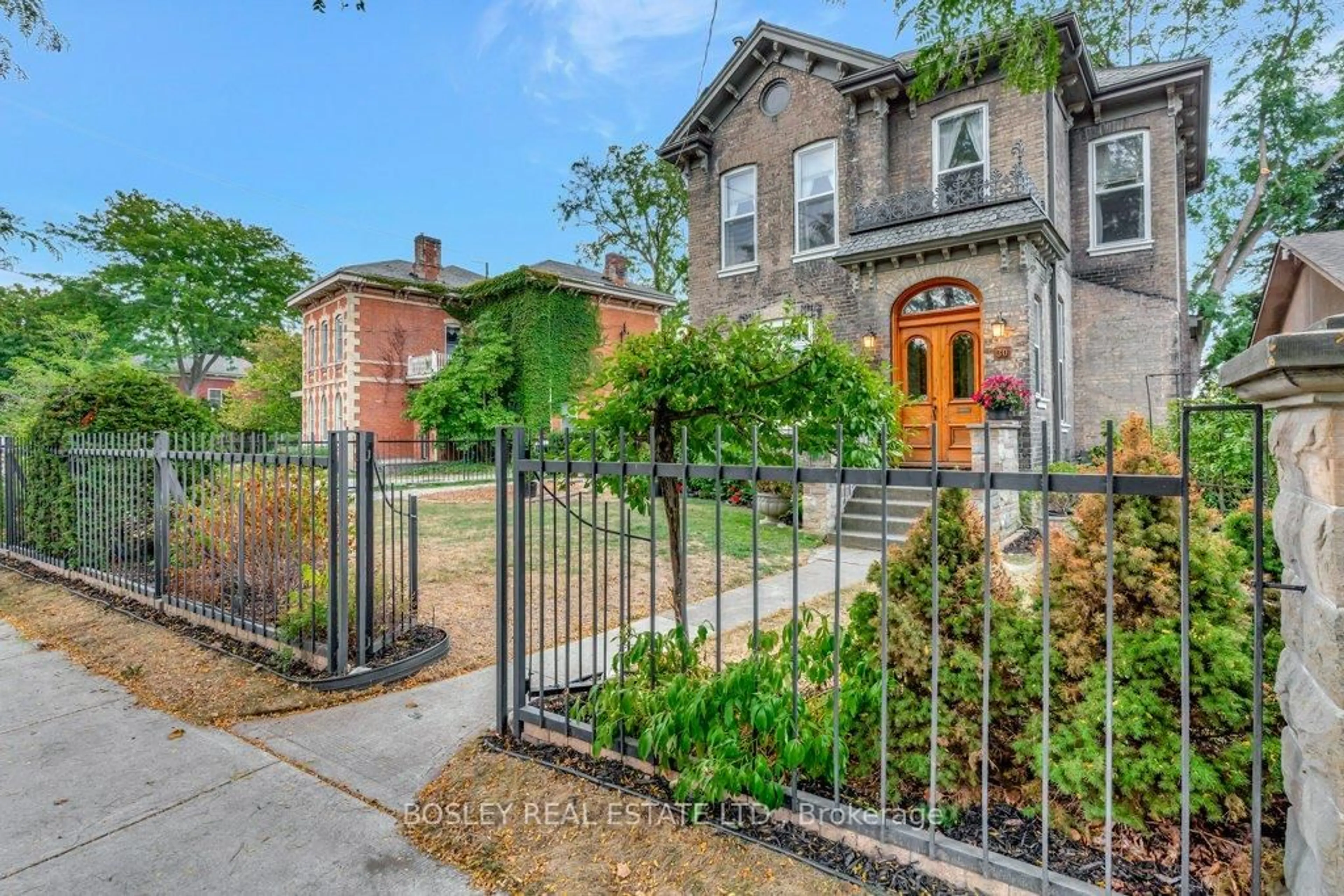 Home with brick exterior material, street for 30 Lorne Cres, Brantford Ontario N3T 4L7