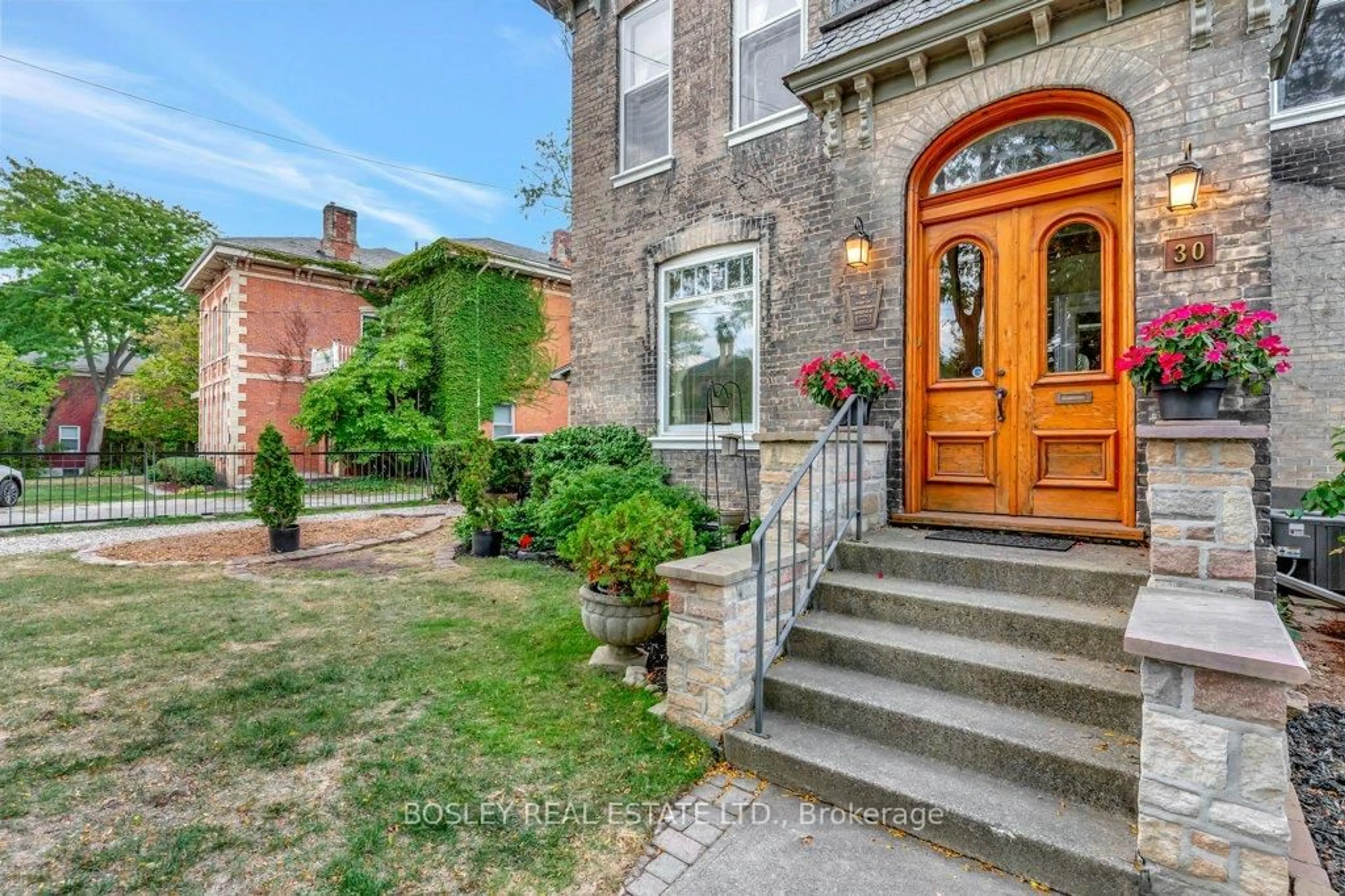 Home with brick exterior material, street for 30 Lorne Cres, Brantford Ontario N3T 4L7