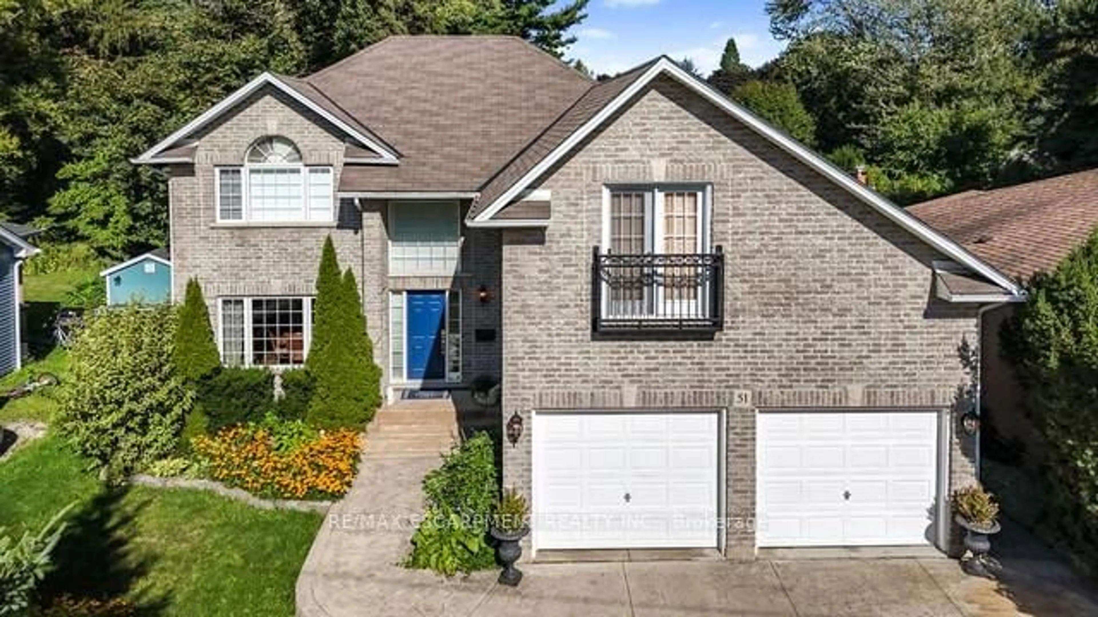 Home with brick exterior material, street for 51 Orchard Dr, Hamilton Ontario L9G 1Z6