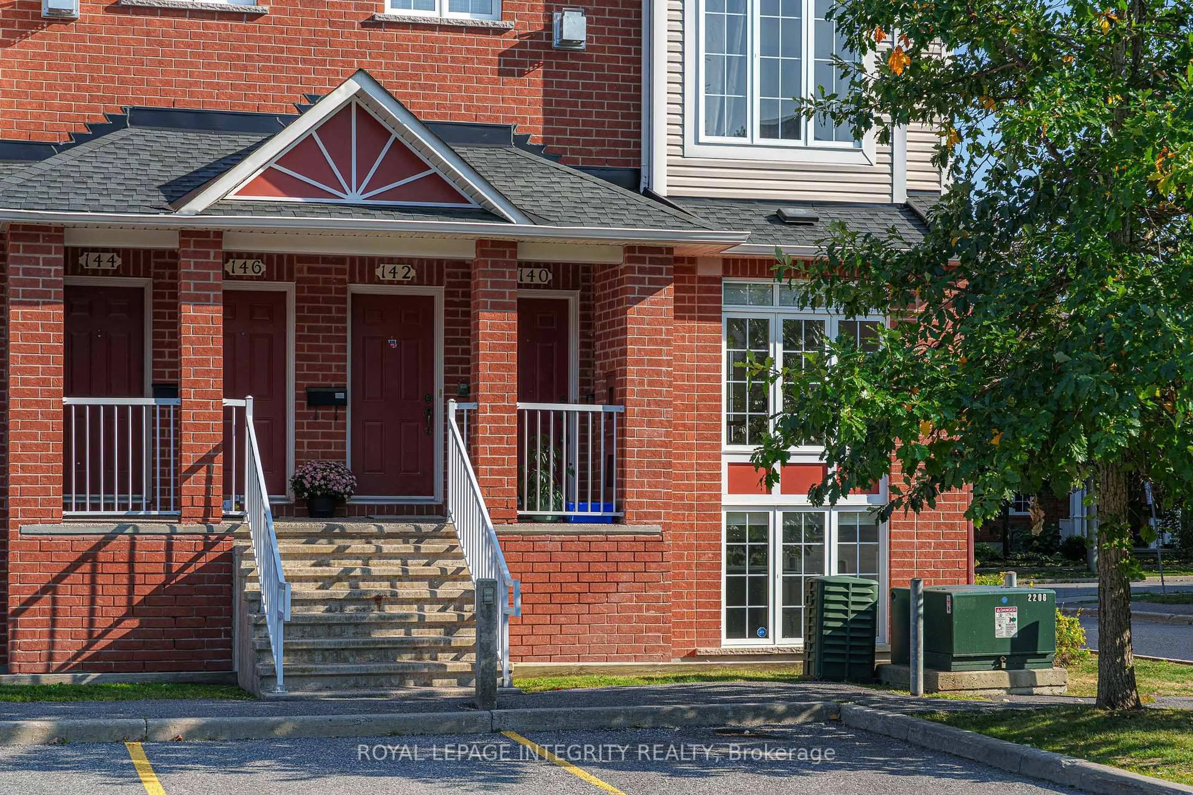 Home with brick exterior material, street for 70 Edenvale Dr #140, Ottawa Ontario K2K 3N6