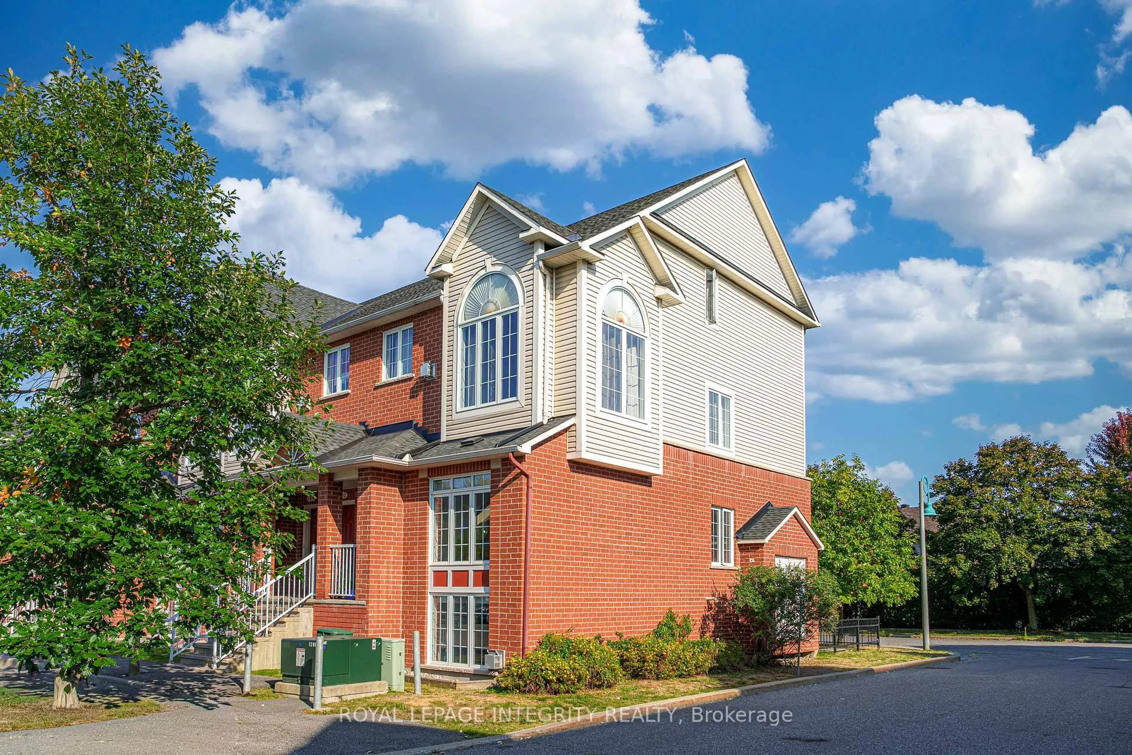 Home with brick exterior material, street for 70 Edenvale Dr #140, Ottawa Ontario K2K 3N6