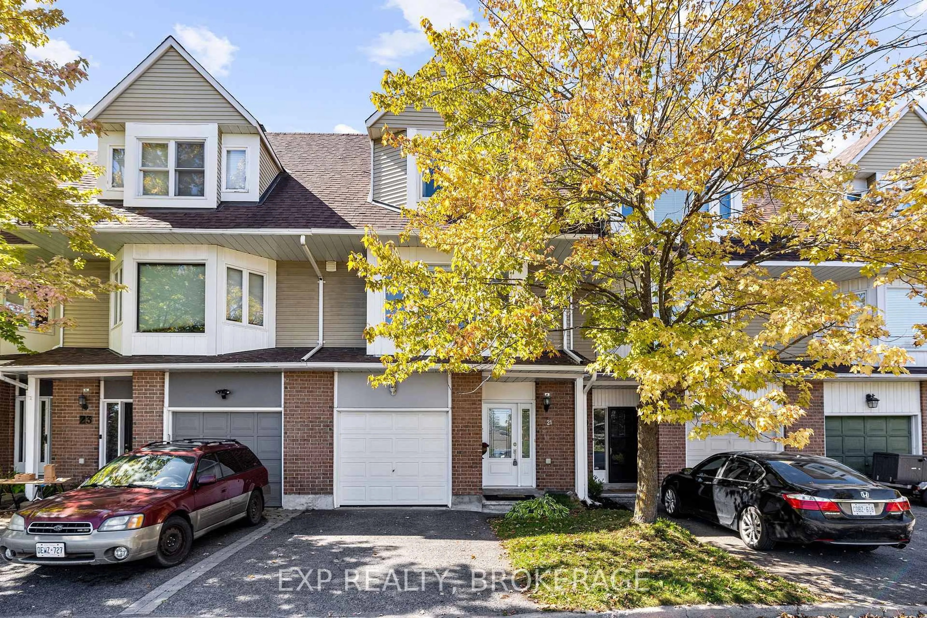 Home with brick exterior material, street for 21 DURBIN Crt, Kanata Ontario K2L 3T7