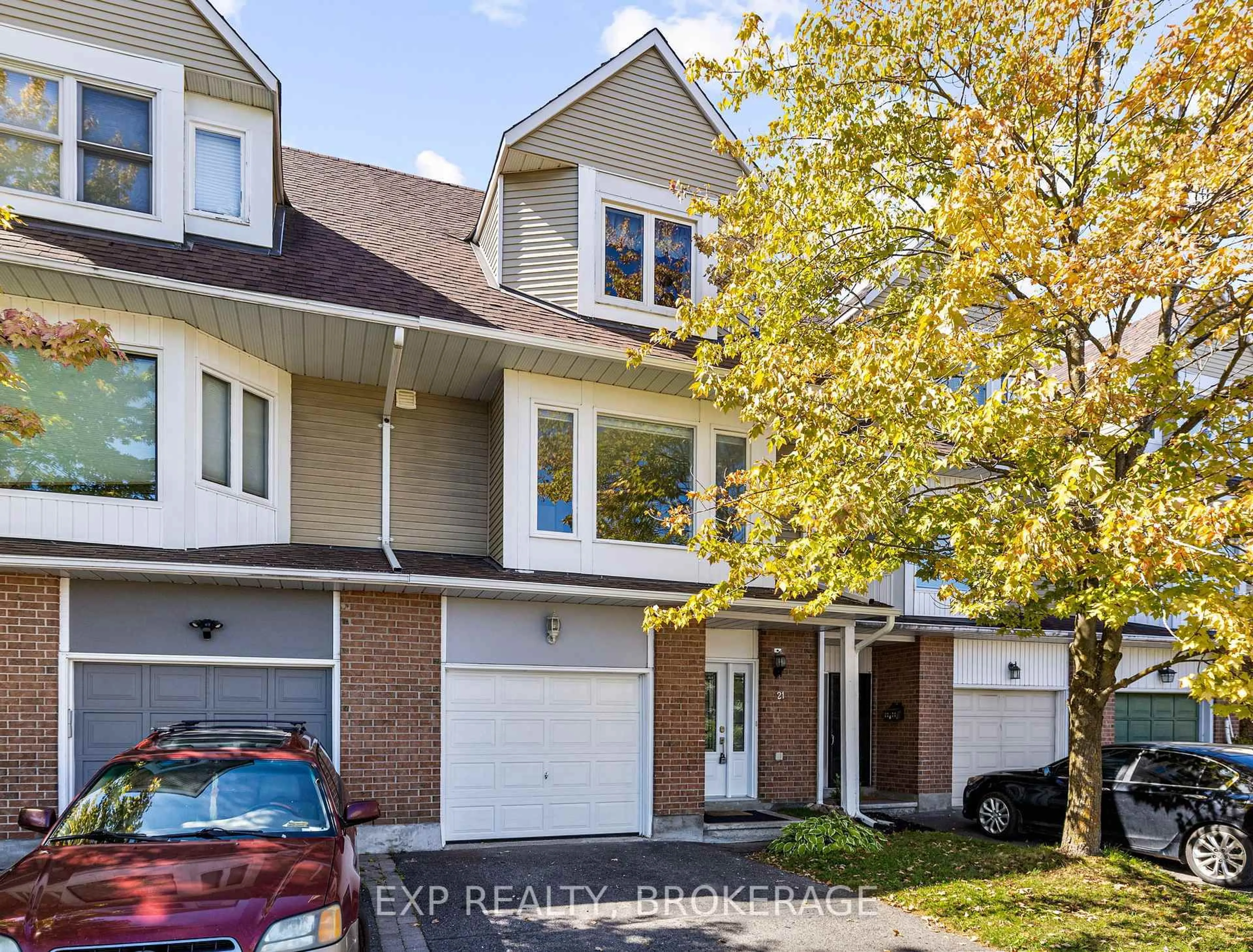 Home with vinyl exterior material, street for 21 DURBIN Crt, Kanata Ontario K2L 3T7