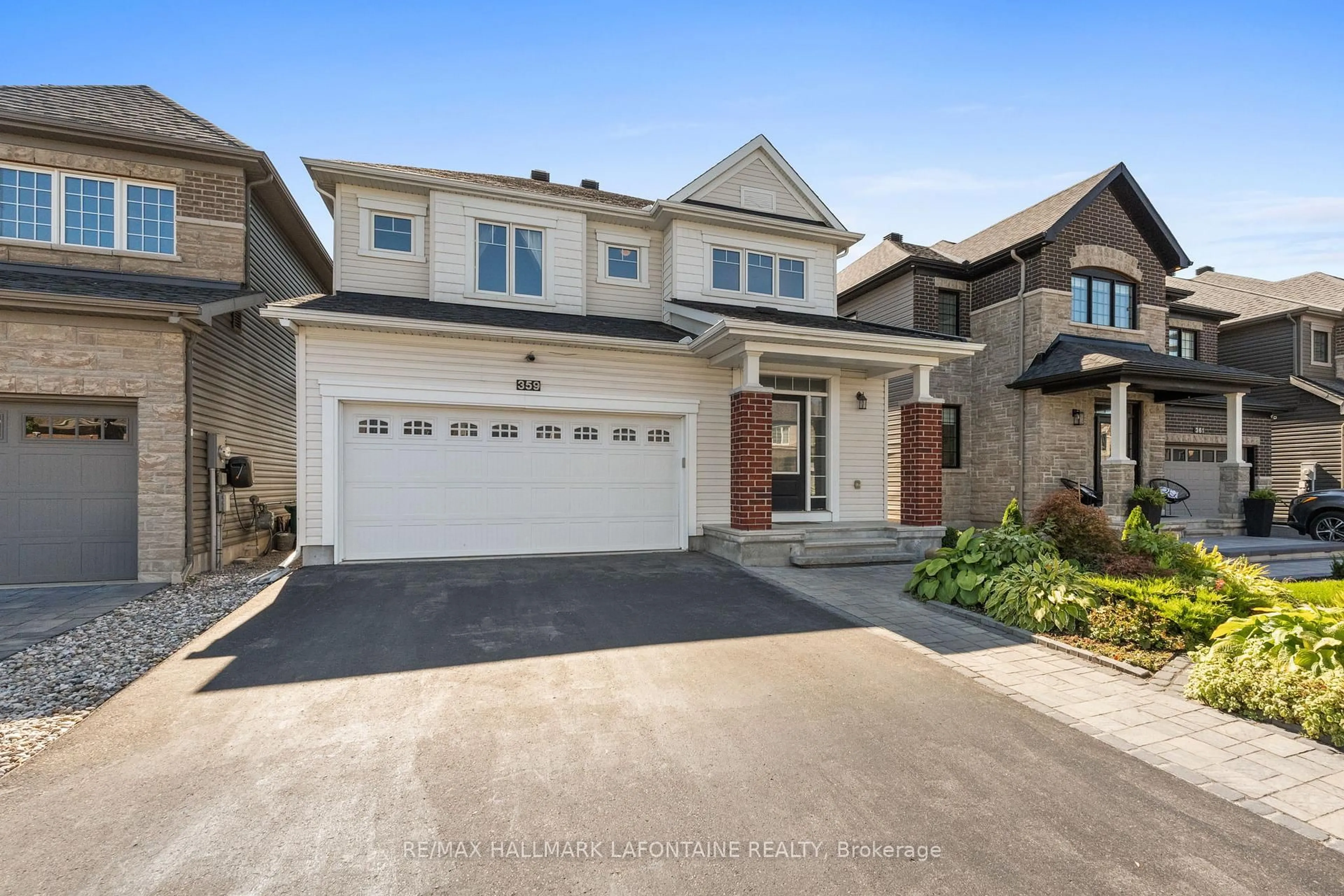 Home with brick exterior material, street for 359 Hepatica Way, Ottawa Ontario K4A 0Z1