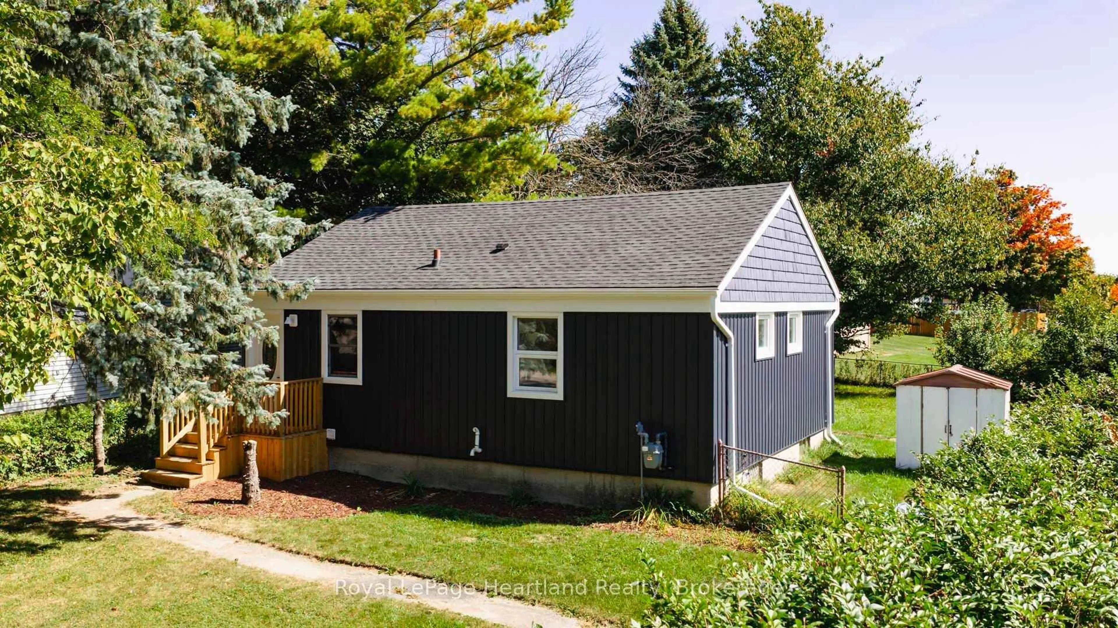 Home with vinyl exterior material, street for 26 Quebec Rd, Huron East Ontario N0M 1L0