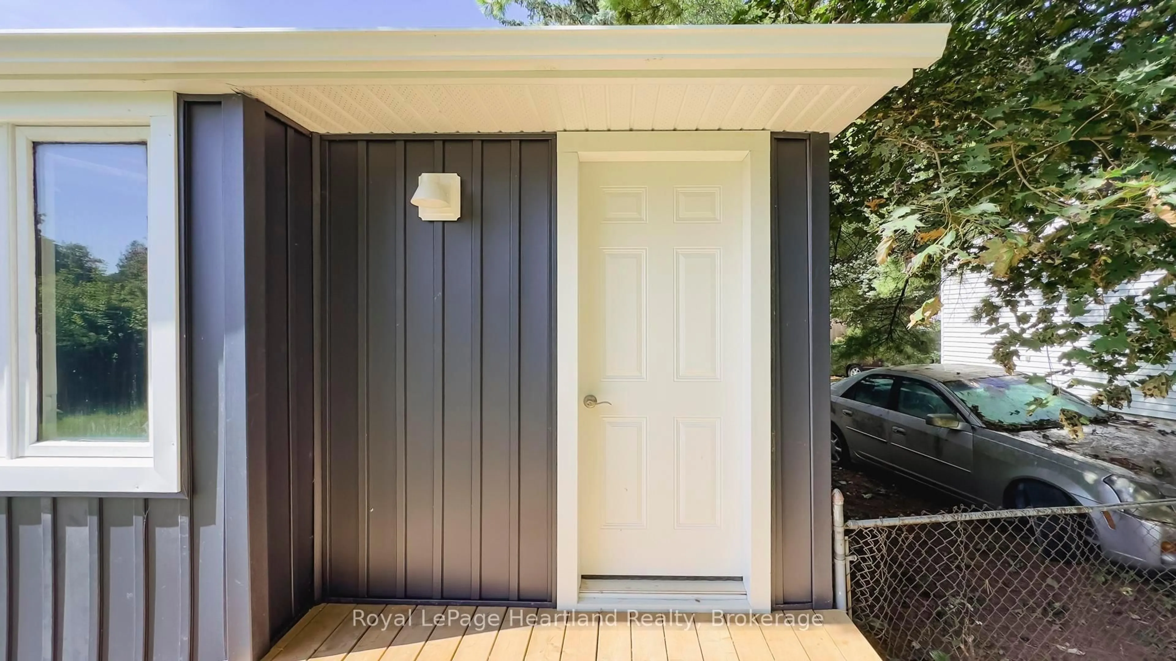 Home with vinyl exterior material, street for 26 Quebec Rd, Huron East Ontario N0M 1L0