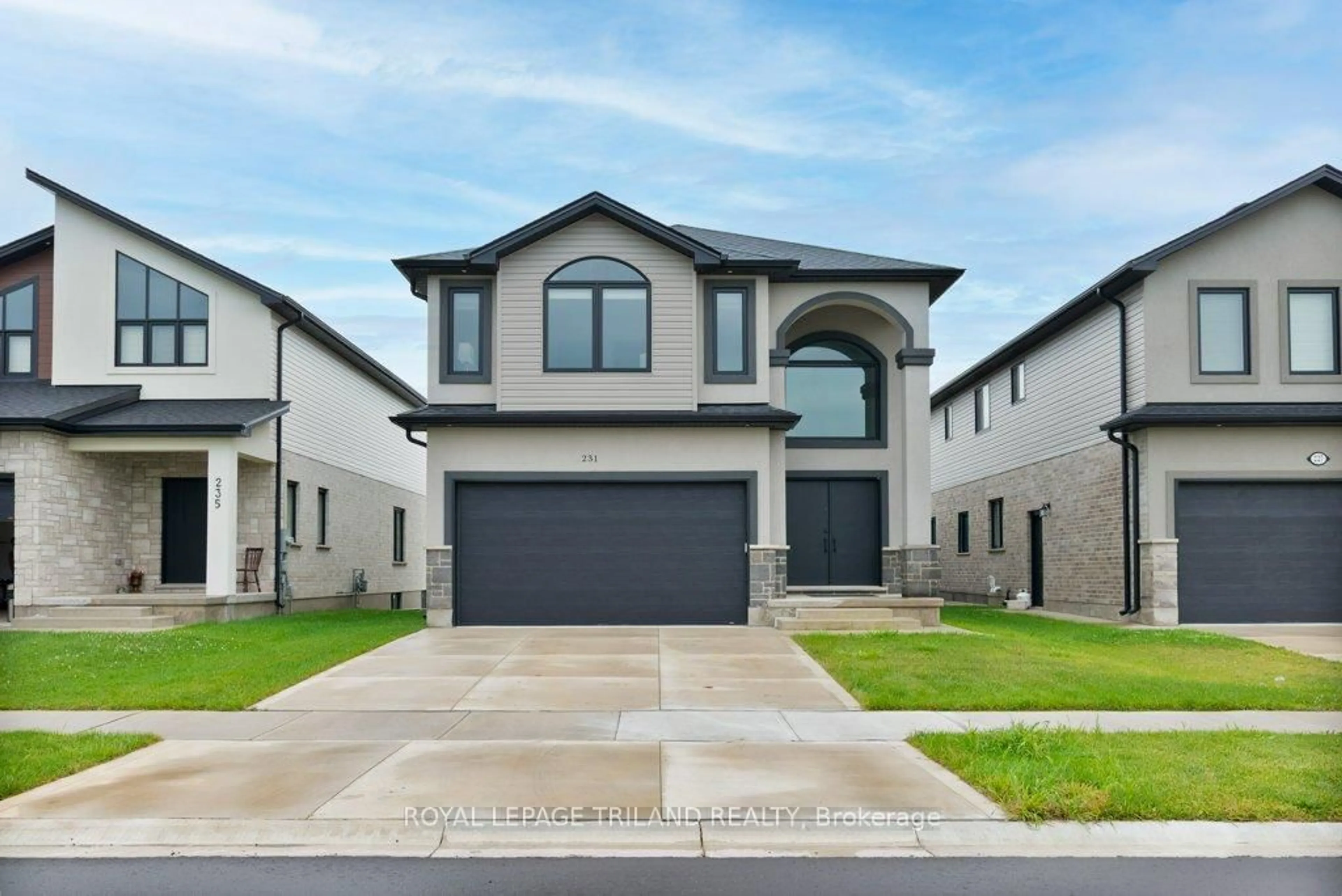 Home with vinyl exterior material, street for 231 Roy Mcdonald Dr, London South Ontario N6L 0J1