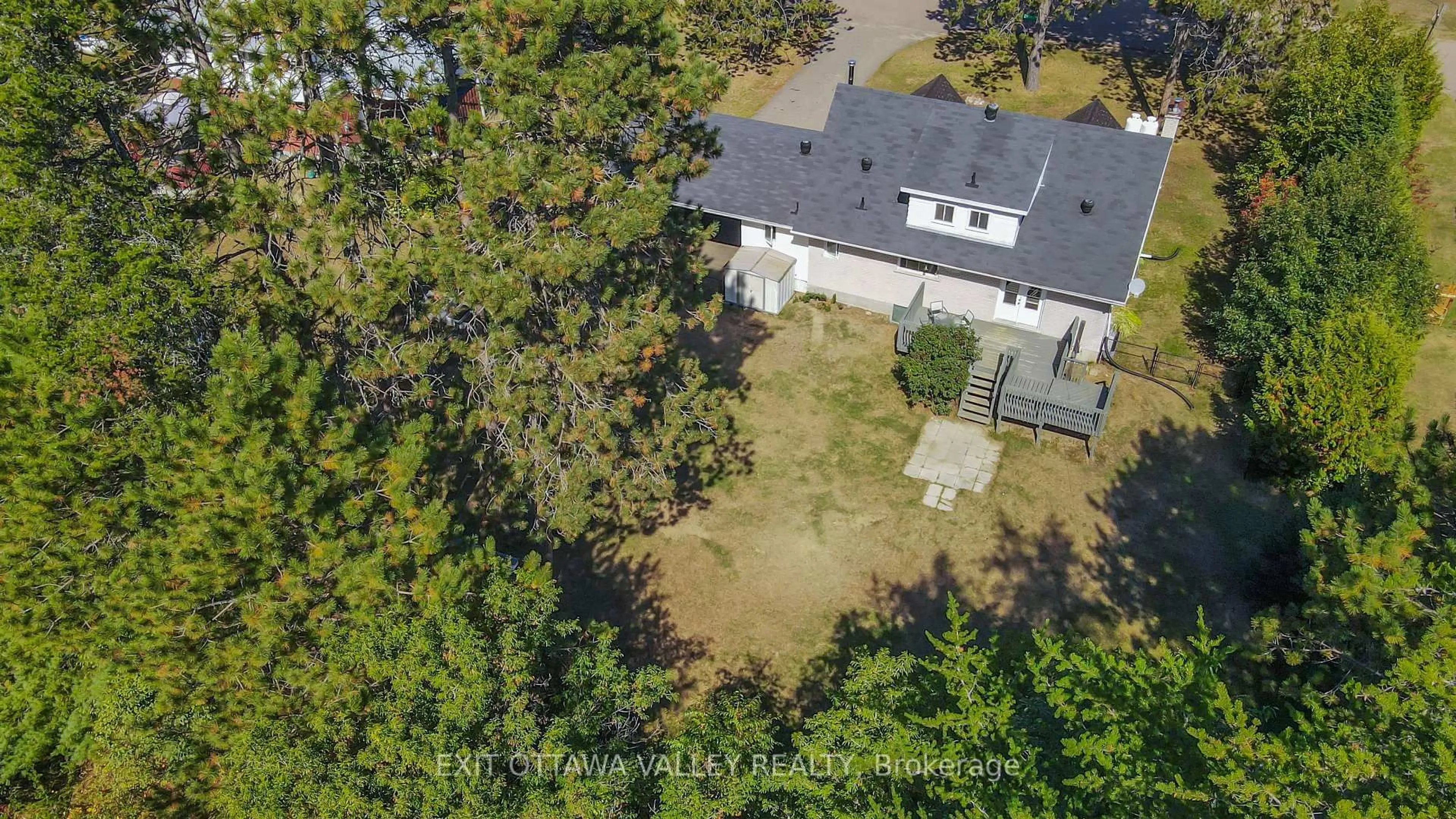 A pic from outside/outdoor area/front of a property/back of a property/a pic from drone, forest/trees view for 23 Sprucedale Ave, Barry's Bay Ontario K0J 1B0
