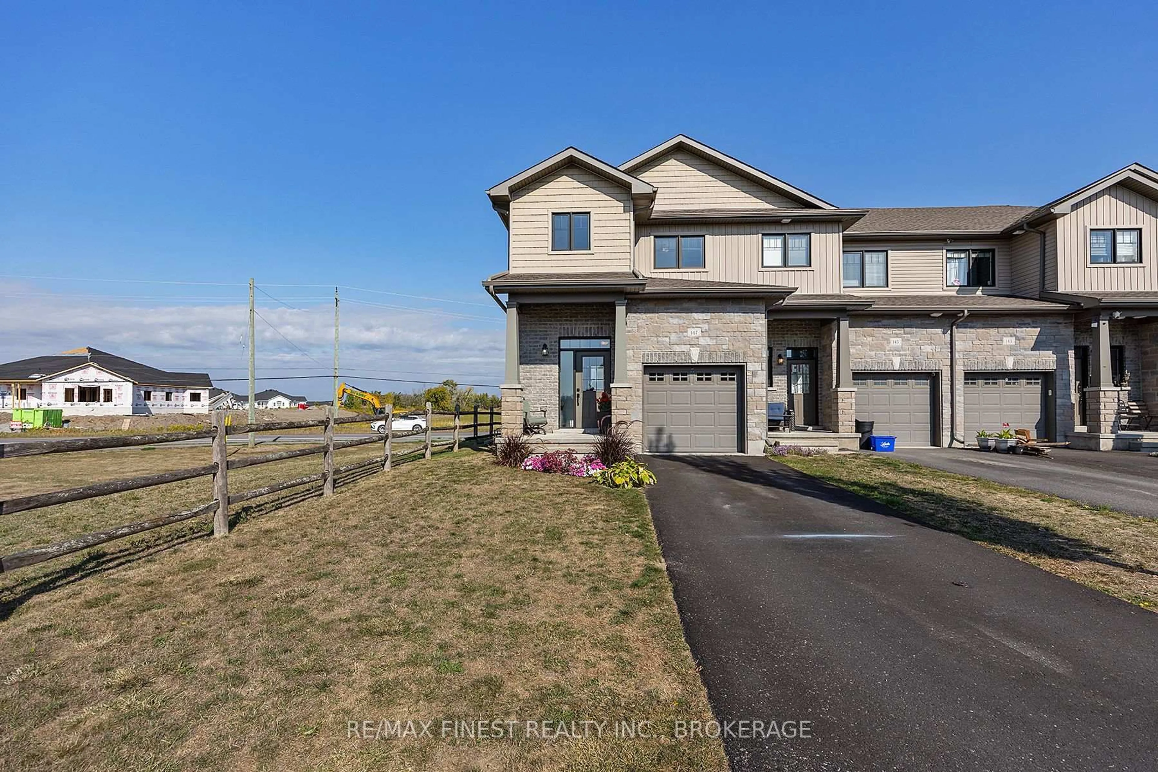 A pic from outside/outdoor area/front of a property/back of a property/a pic from drone, water/lake/river/ocean view for 147 SIMURDA Crt, Loyalist Ontario K7N 0A8