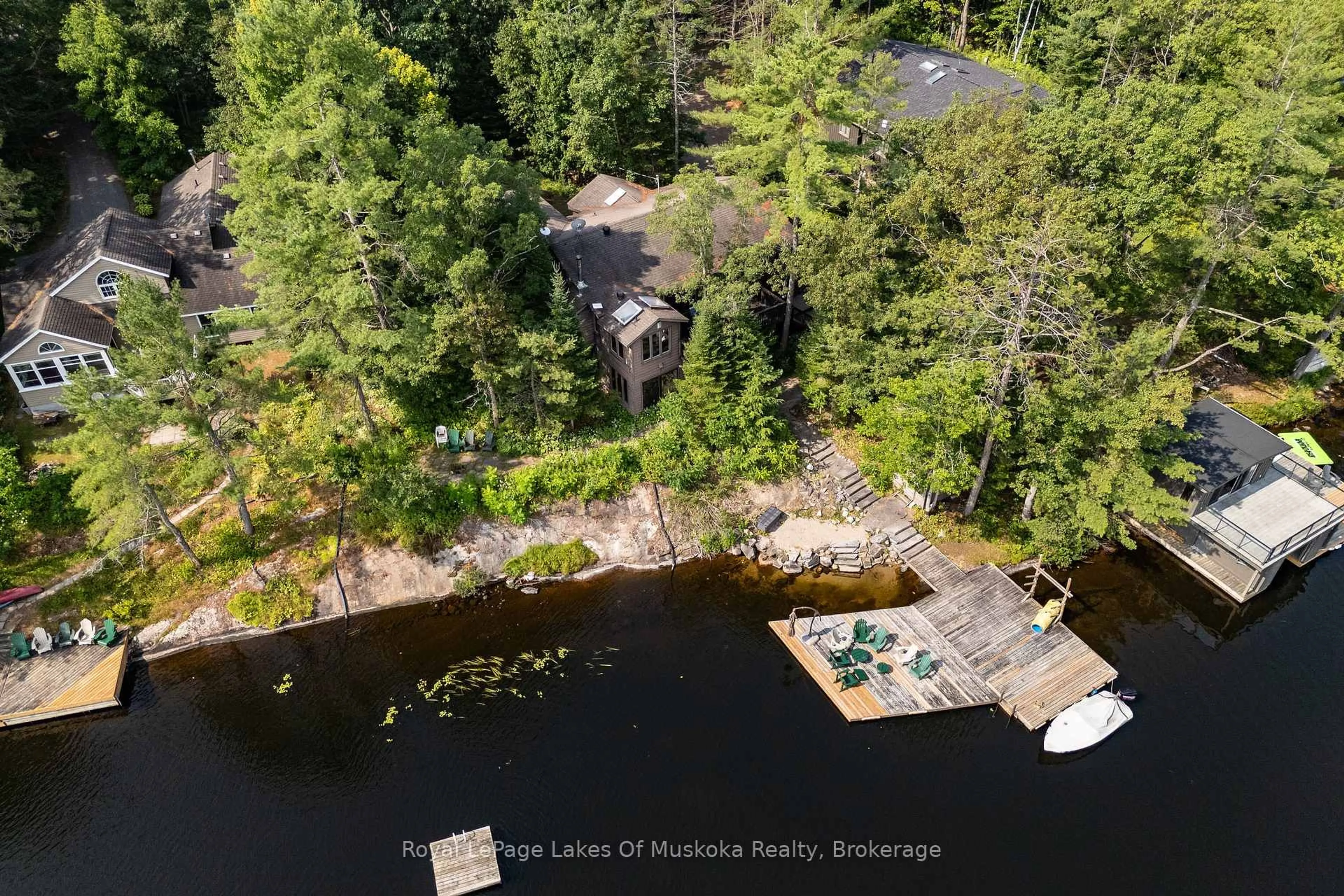 A pic from outside/outdoor area/front of a property/back of a property/a pic from drone, water/lake/river/ocean view for 51 Pinetree Rd, Gravenhurst Ontario P1P 1R2