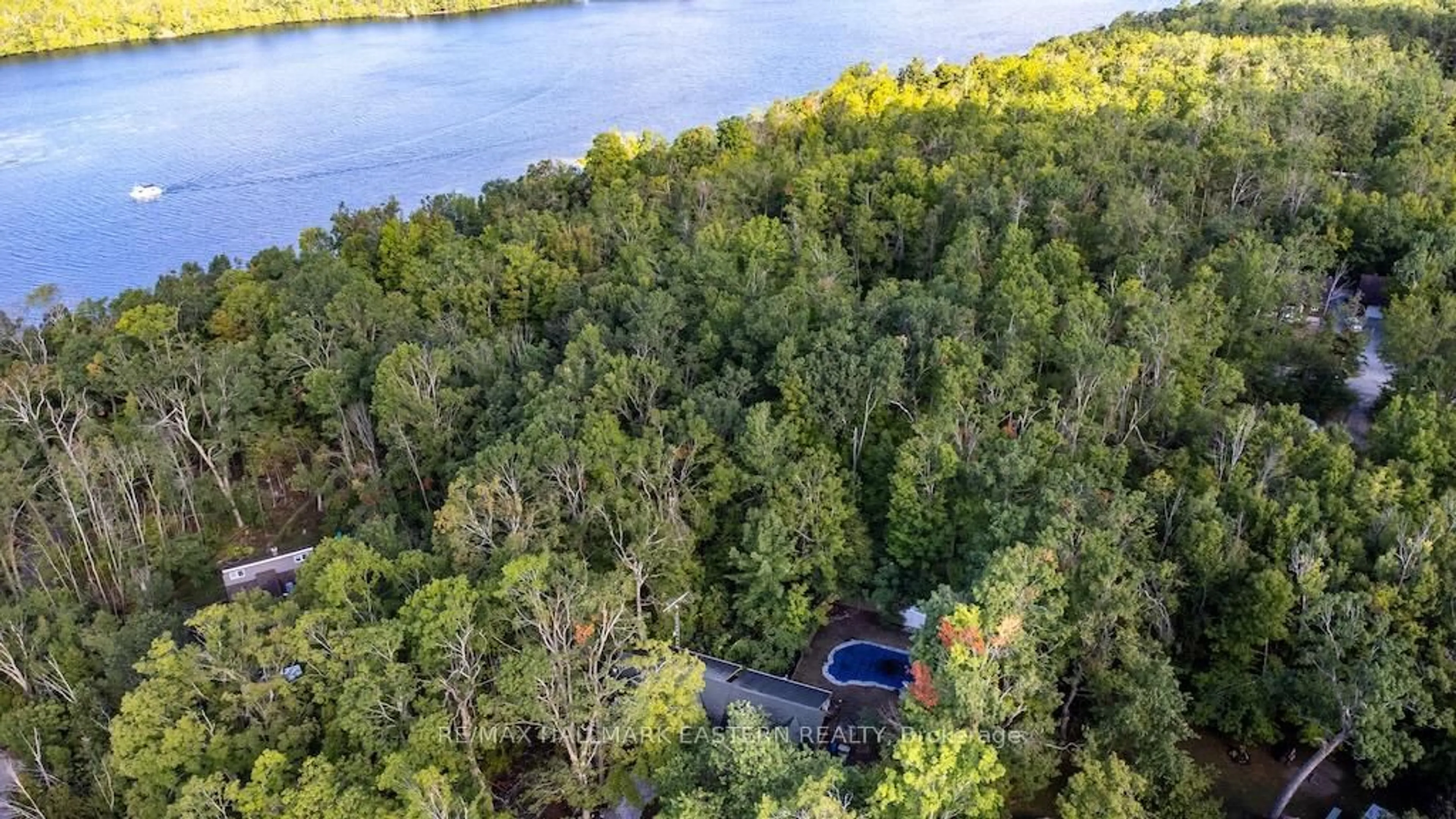 A pic from outside/outdoor area/front of a property/back of a property/a pic from drone, water/lake/river/ocean view for 22 Carolina Crt, Trent Lakes Ontario K9J 6X2
