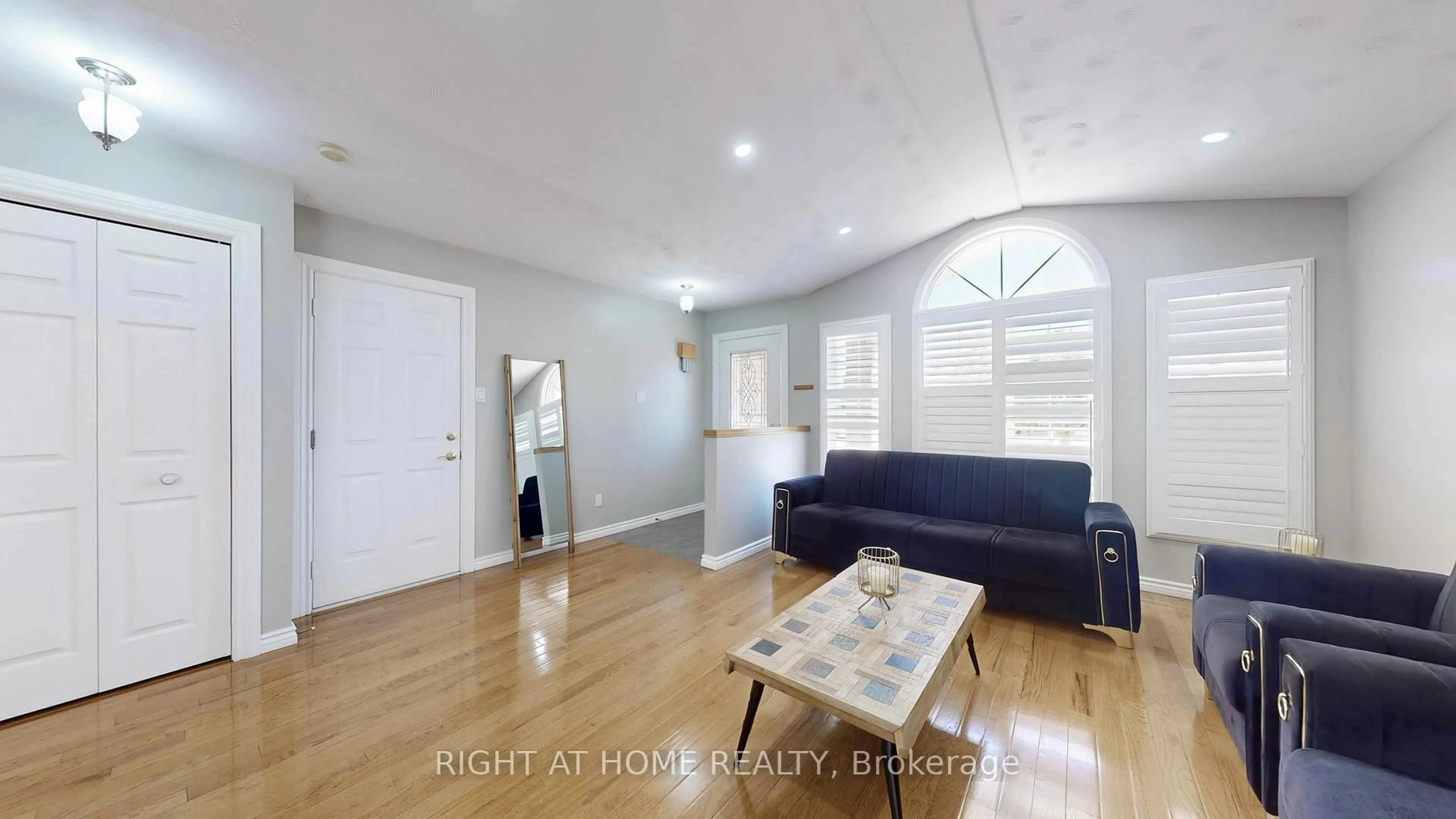 Living room with furniture, wood/laminate floor for 183 Alderlea Ave, Hamilton Ontario L0R 1W0