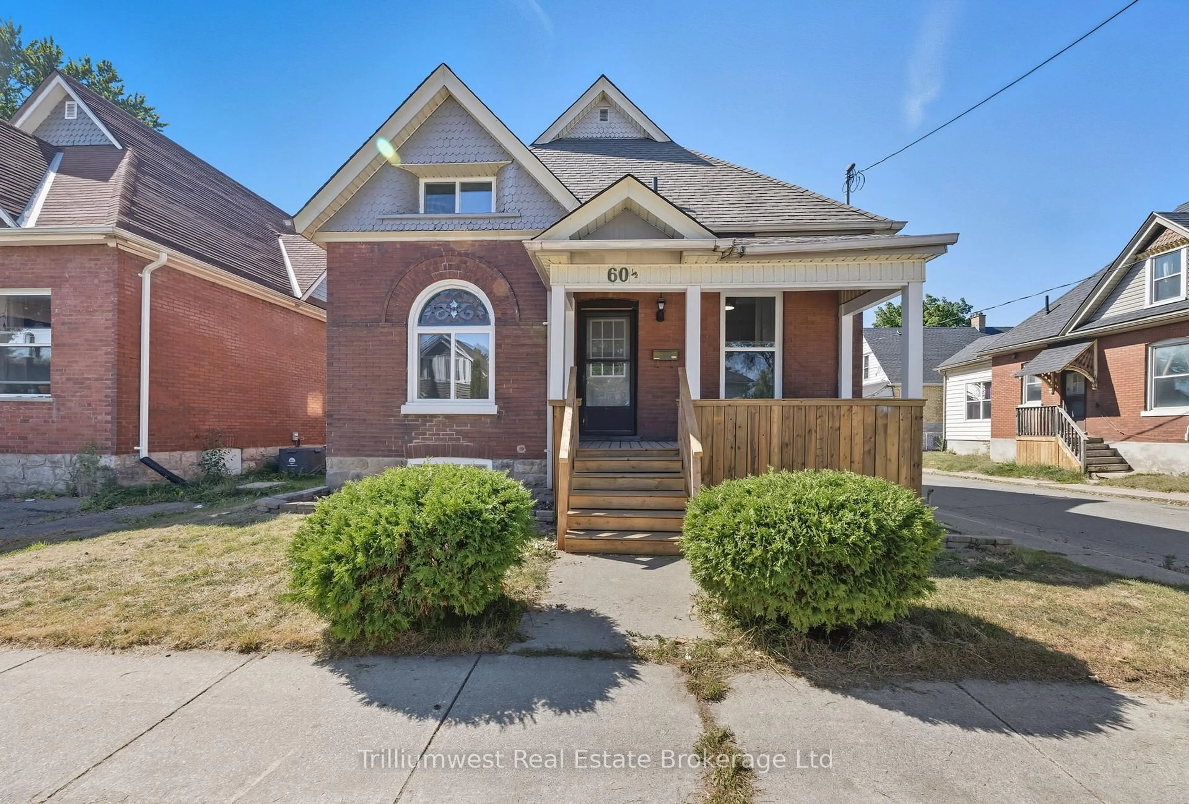 Home with brick exterior material, street for 60 1/2 St Catharine St, St. Thomas Ontario N5P 2W1