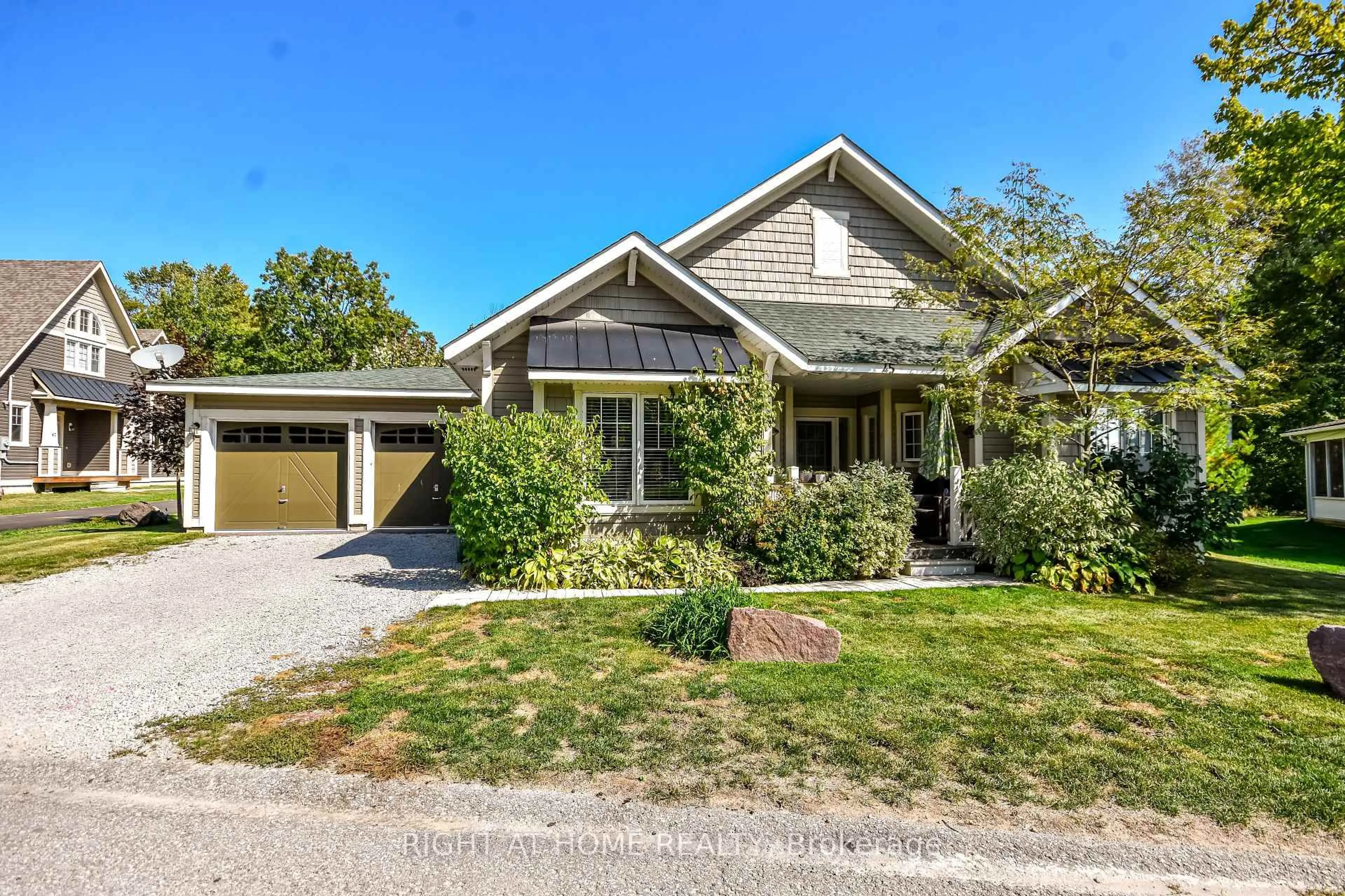 Home with brick exterior material, street for 45 Marina Village Dr, Georgian Bay Ontario L0K 1S0