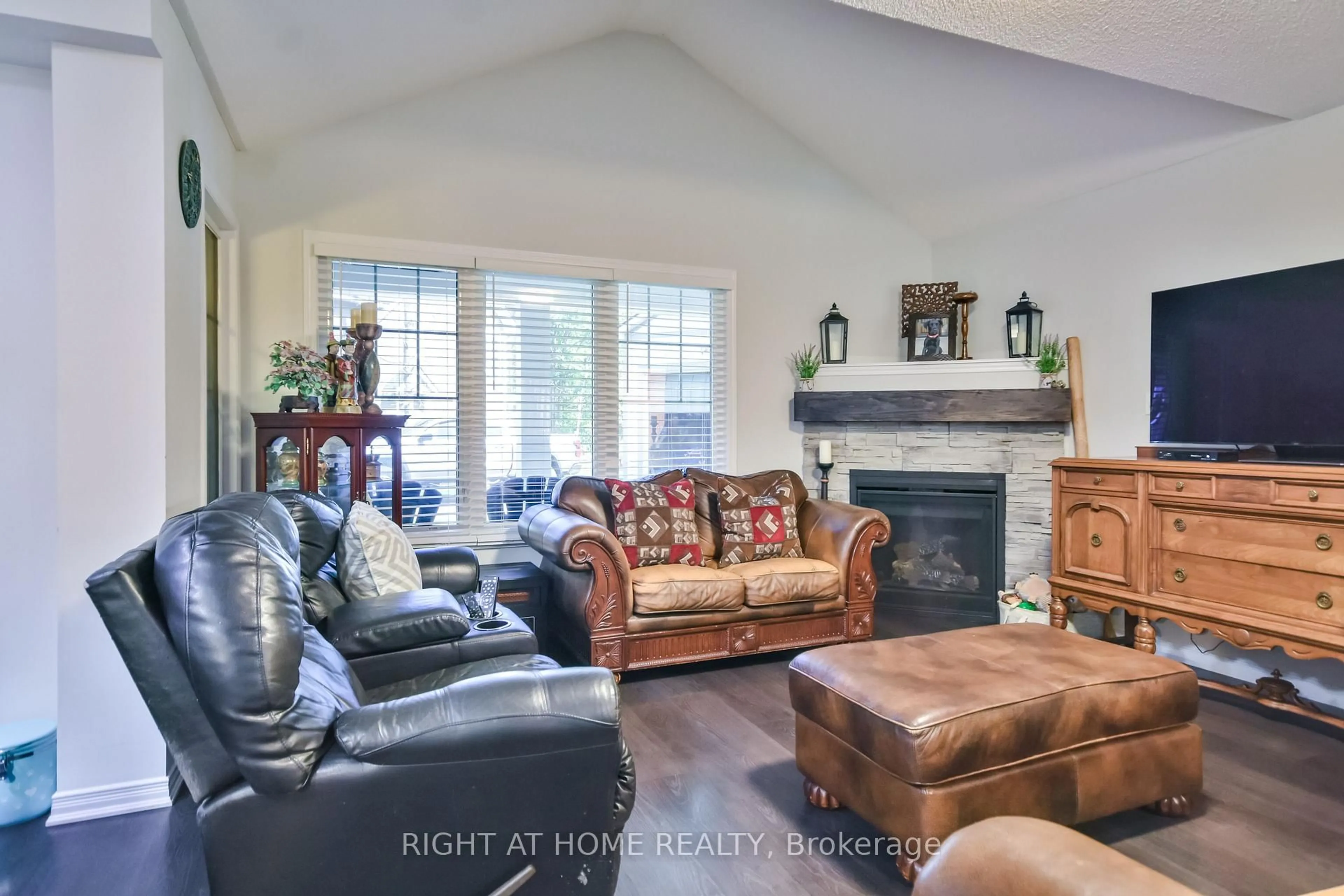 Living room with furniture, ceramic/tile floor for 45 Marina Village Dr, Georgian Bay Ontario L0K 1S0