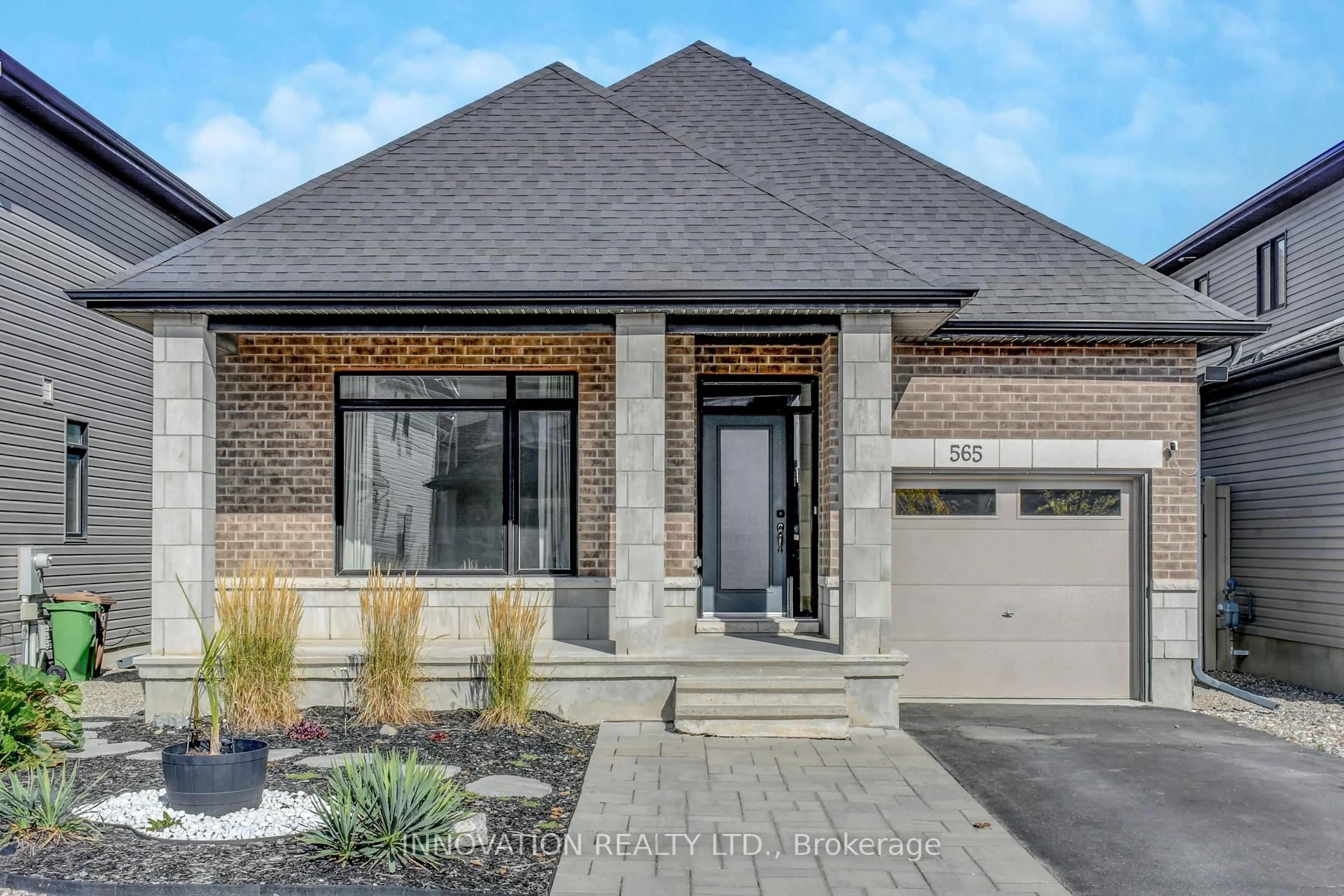 Home with brick exterior material, street for 565 Bobolink Rdge, Ottawa Ontario K2S 2P4