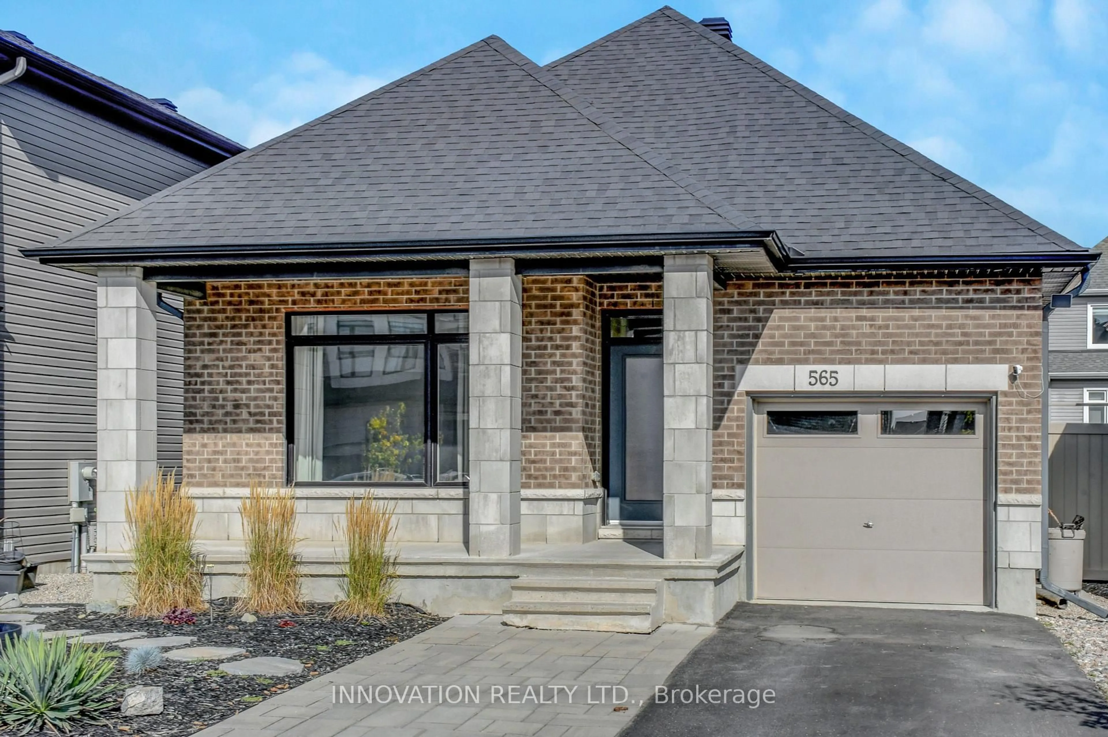 Home with brick exterior material, street for 565 Bobolink Rdge, Ottawa Ontario K2S 2P4