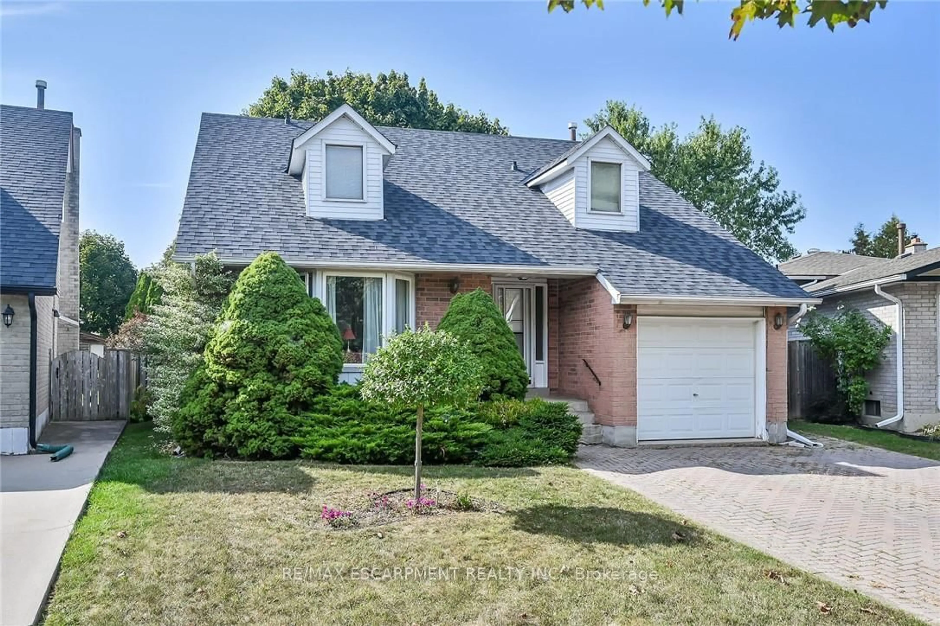 Home with brick exterior material, street for 71 Kennard St, Hamilton Ontario L8J 2C4