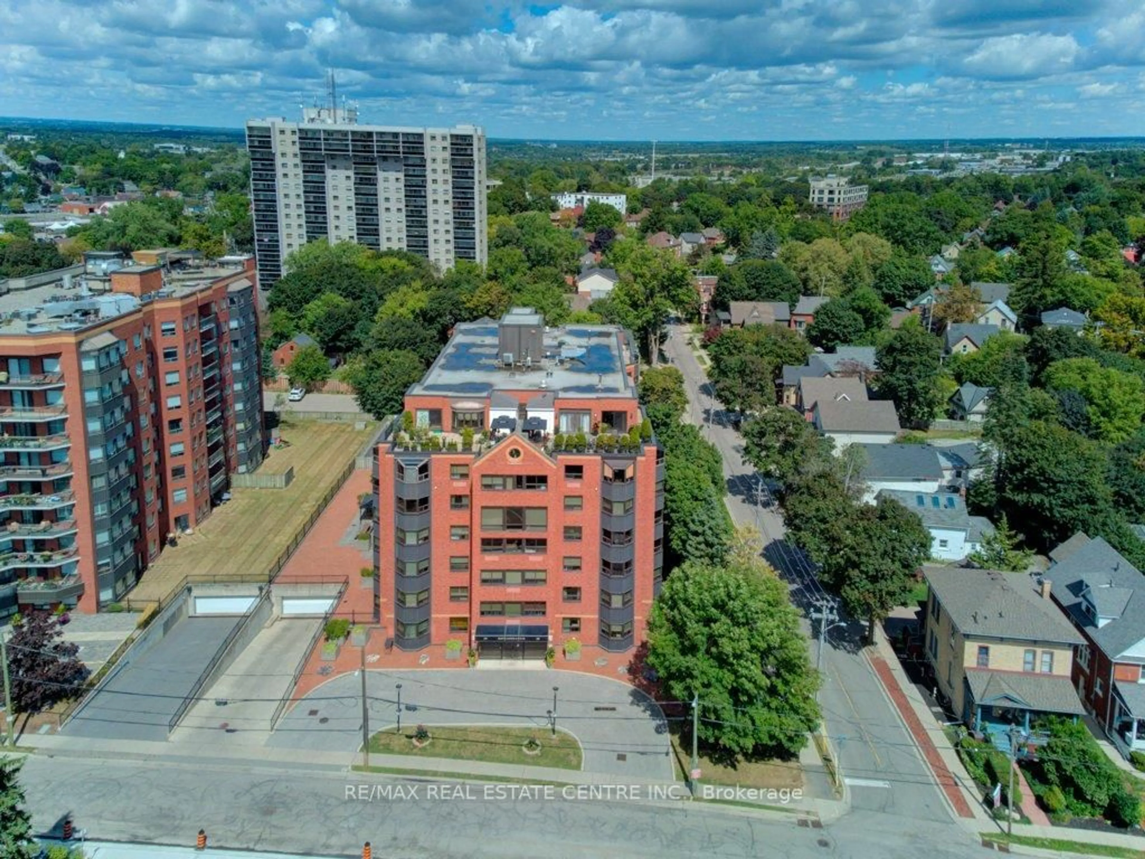A pic from outside/outdoor area/front of a property/back of a property/a pic from drone, city buildings view from balcony for 20 Ellen St #405, Kitchener Ontario N2H 6R7