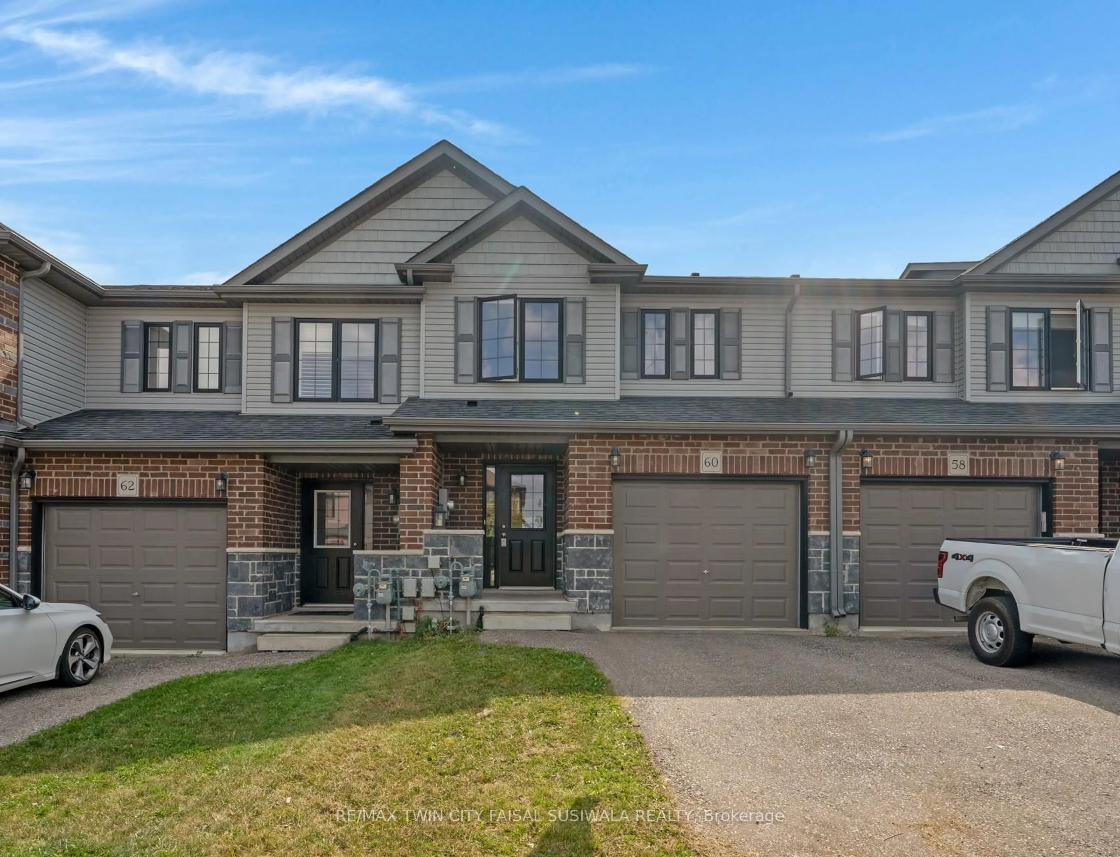 Home with brick exterior material, street for 60 Honey St, Cambridge Ontario N1T 2C9