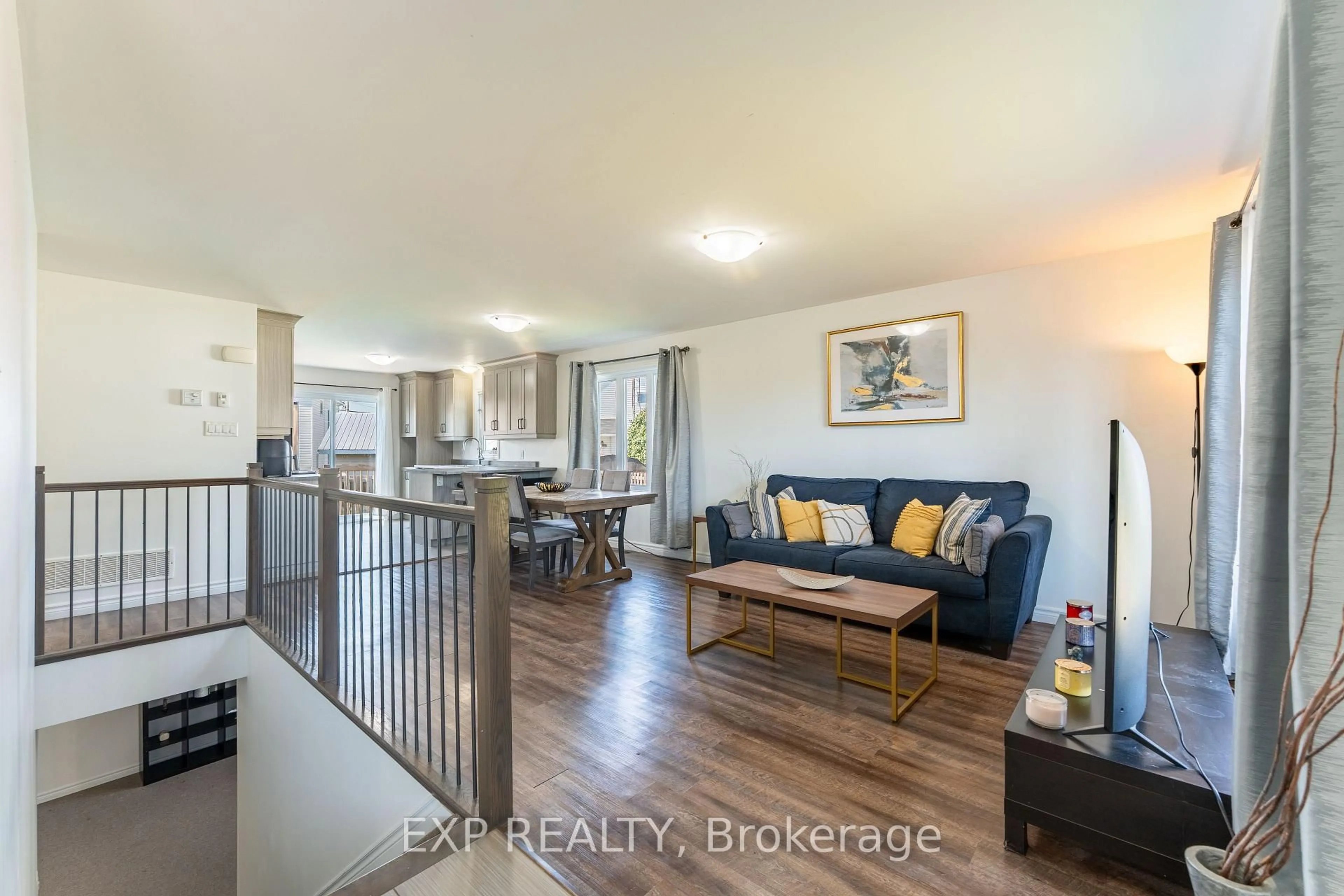 Open concept kitchen, wood/laminate floor for 11 Place Madeleine Pl, The Nation Ontario K0C 2B0
